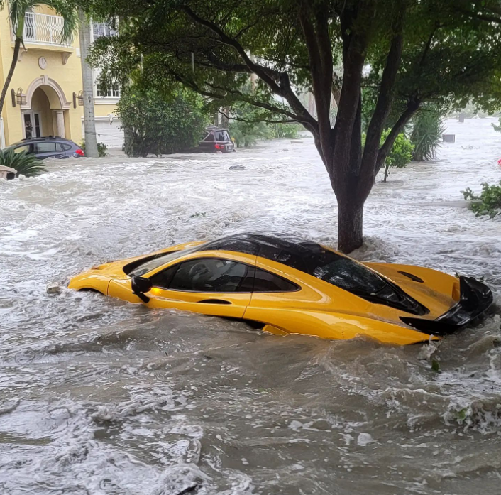 A McLaren P1, a hypercar estimated to be worth more than $1m, was swept out of its owner’s garage in Naples and submerged beneath feet of water after Hurricane Ian tore through his neighbourhood