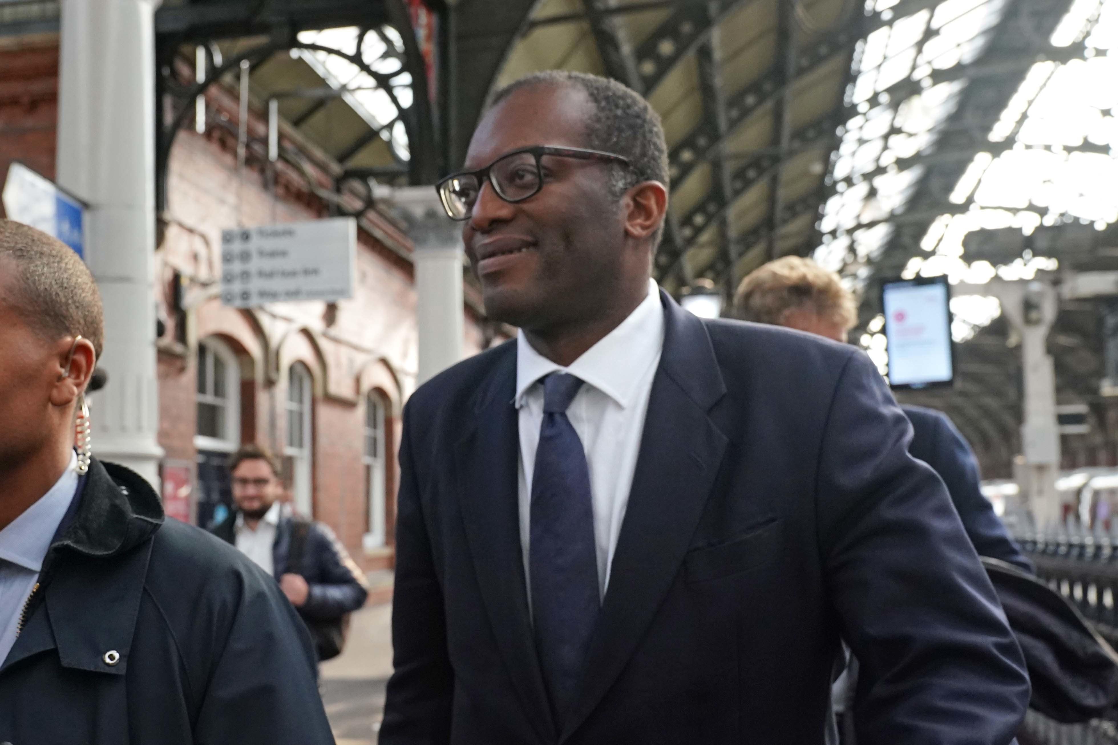 Chancellor Kwasi Kwarteng arrives at Darlington station for a visit to see local businesses (Owen Humphreys/PA)