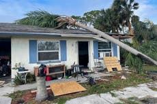 Woman braves Hurricane Ian flood to check on stranger's mom