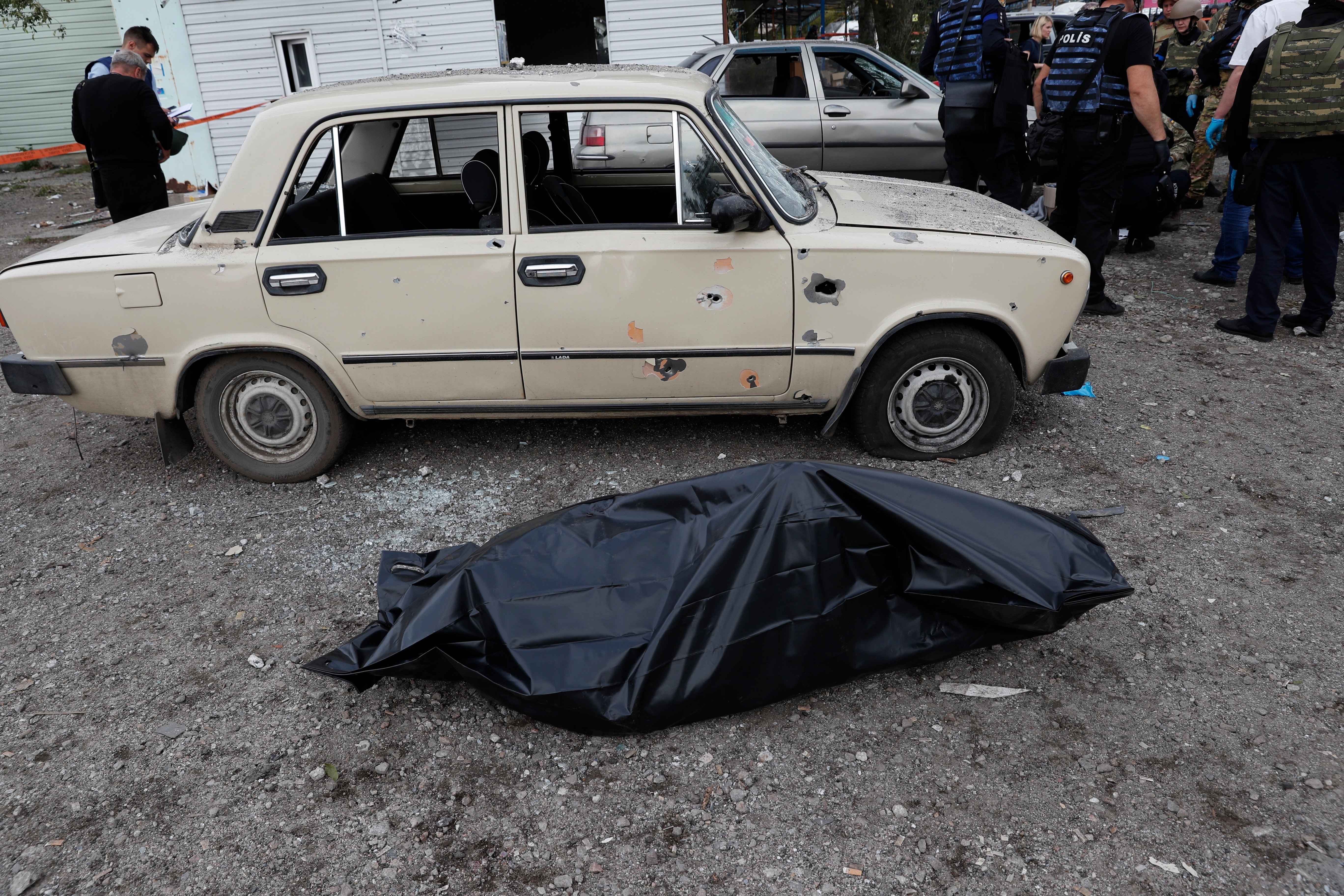 A bodybag at the scene in Zaporizhzhia. At least 25 people have been killed