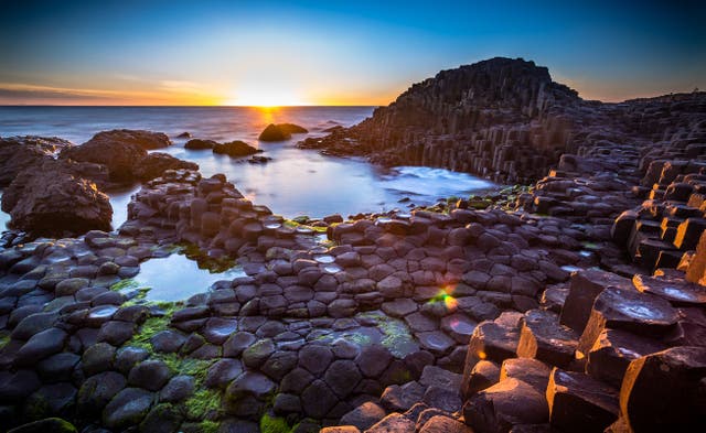 <p>Giant’s Causeway at sunset</p>