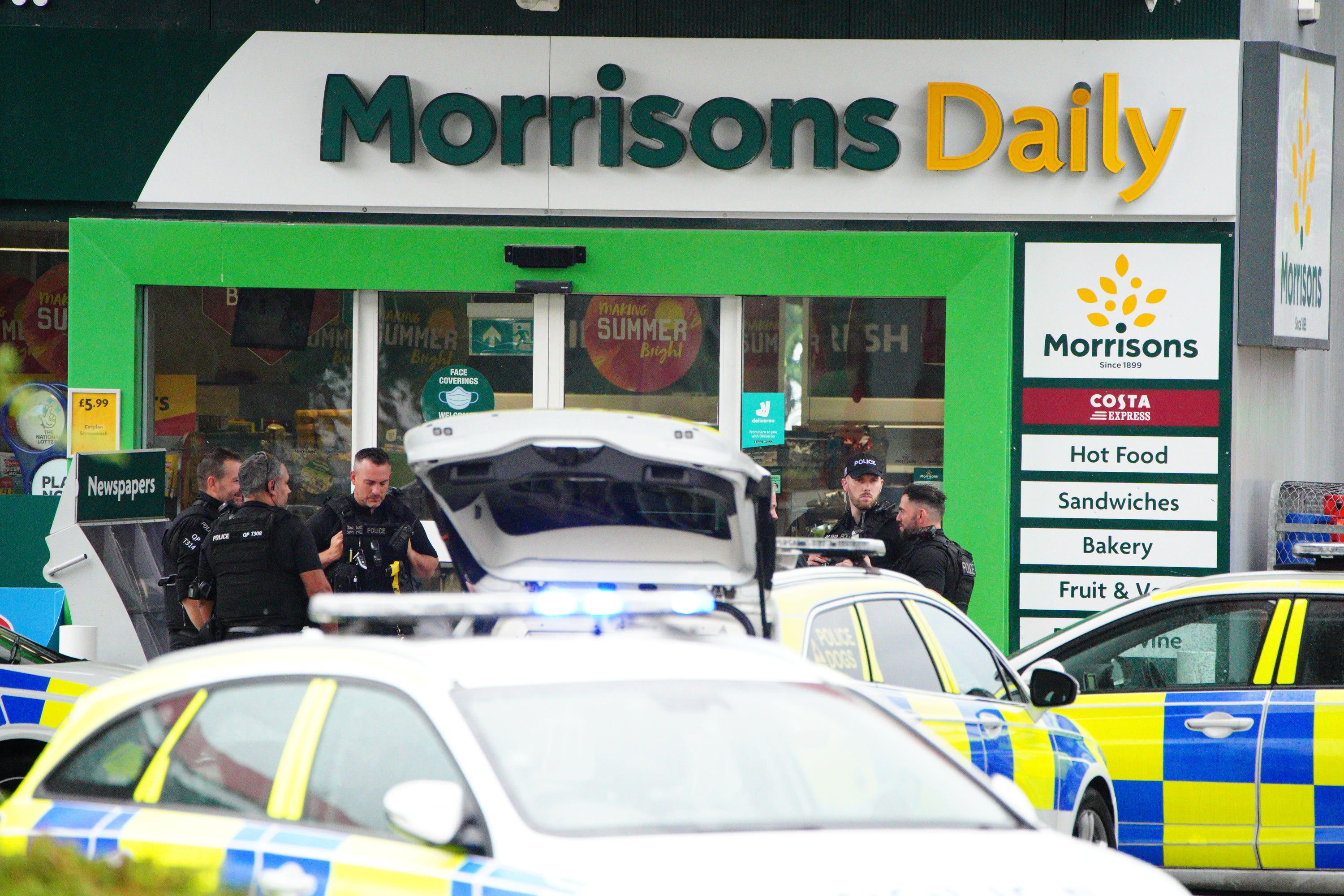 Armed police at the scene on Hengrove Way in Bristol (Ben Birchall/PA)