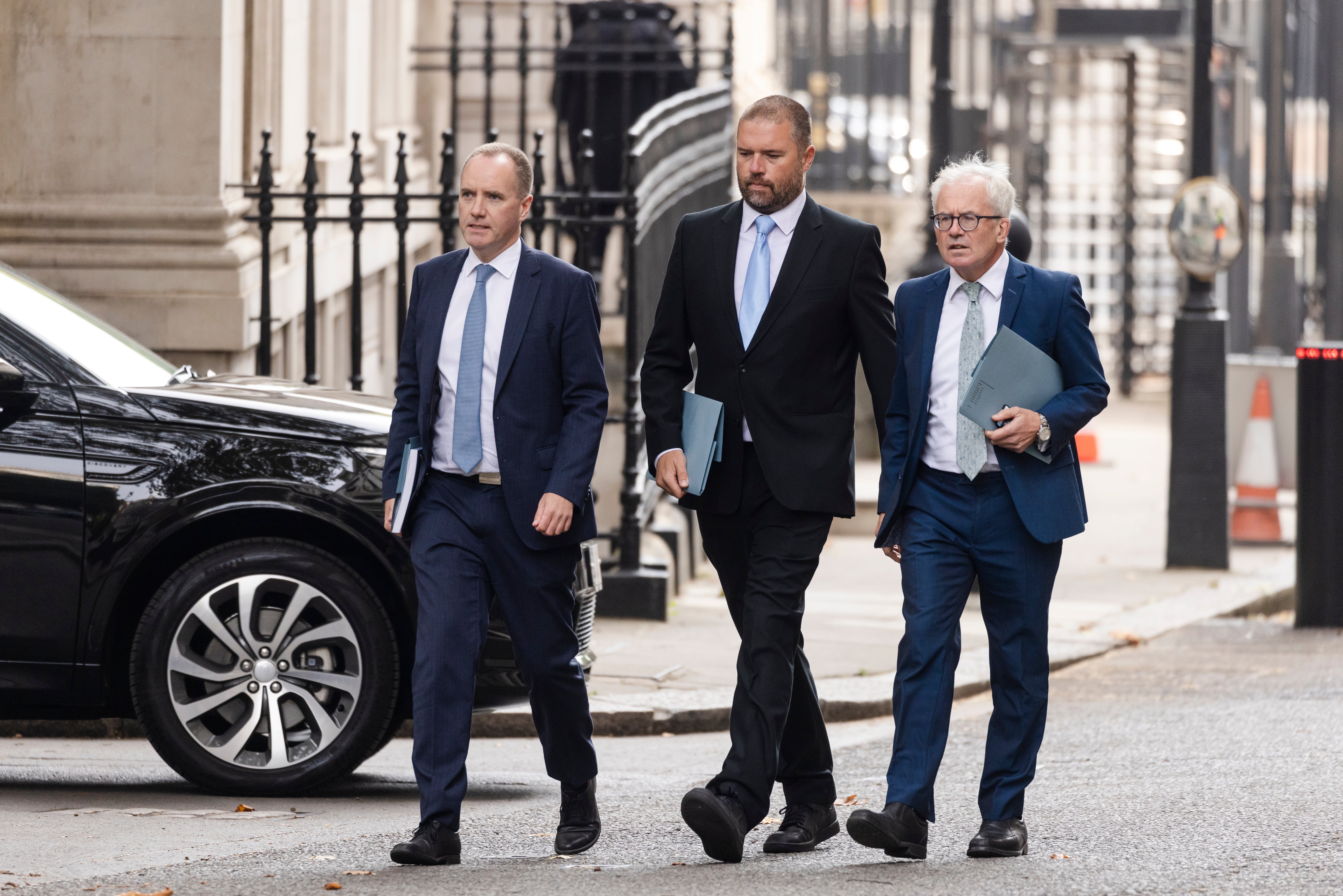 Chair of the Office For Budget Responsibility, Richard Hughes, Member of the Budget Responsibility Committee, Andy King and Prof. David Miles CBE, Member of the Budget Responsibility Committee arrive on Downing Street for a meeting with Liz Truss and Kwasi Kwarteng