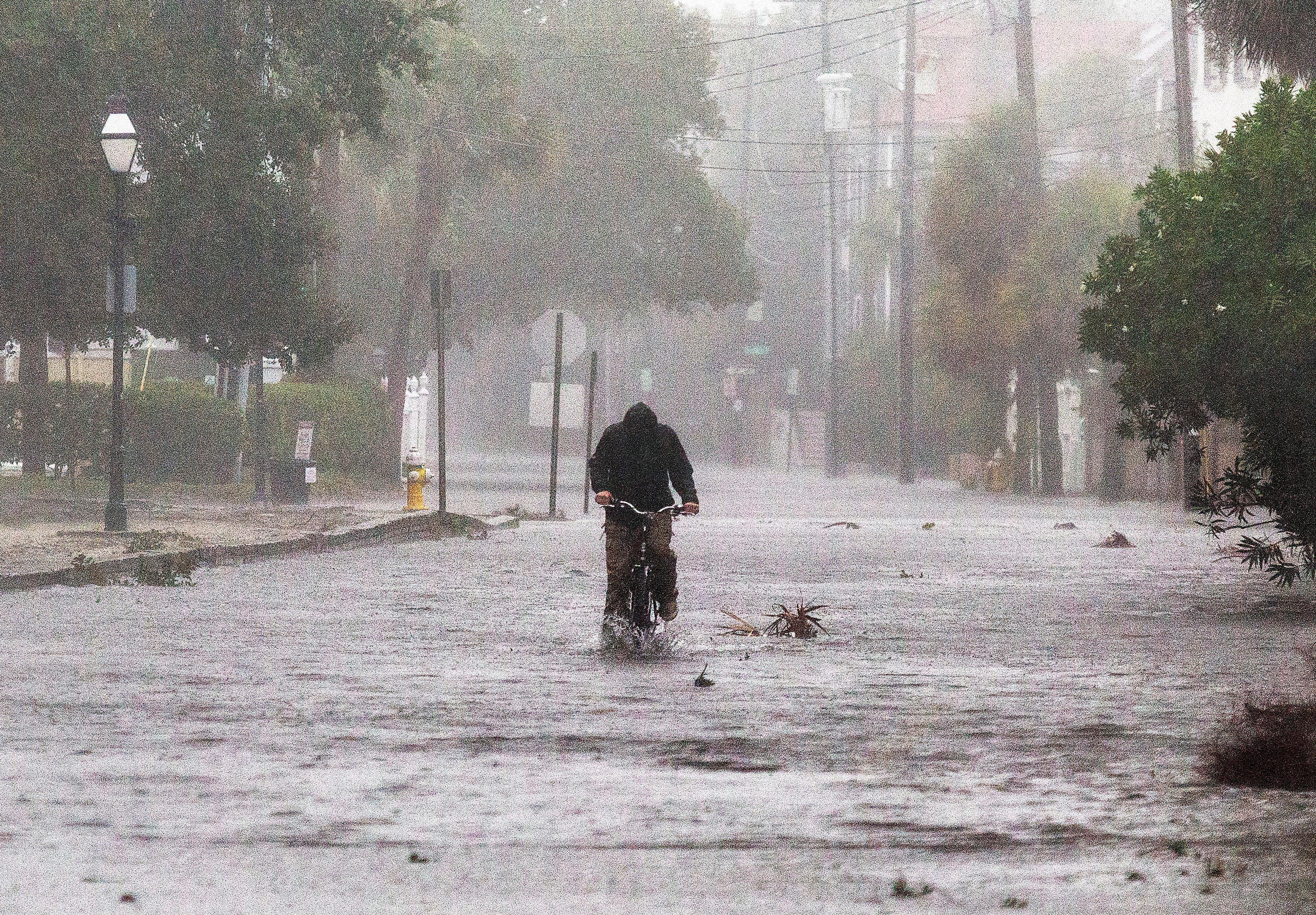 Flood waters cover the street of the South Battery in Charleston, S.C., during Hurricane Ian on Friday, Sept. 30, 2022.