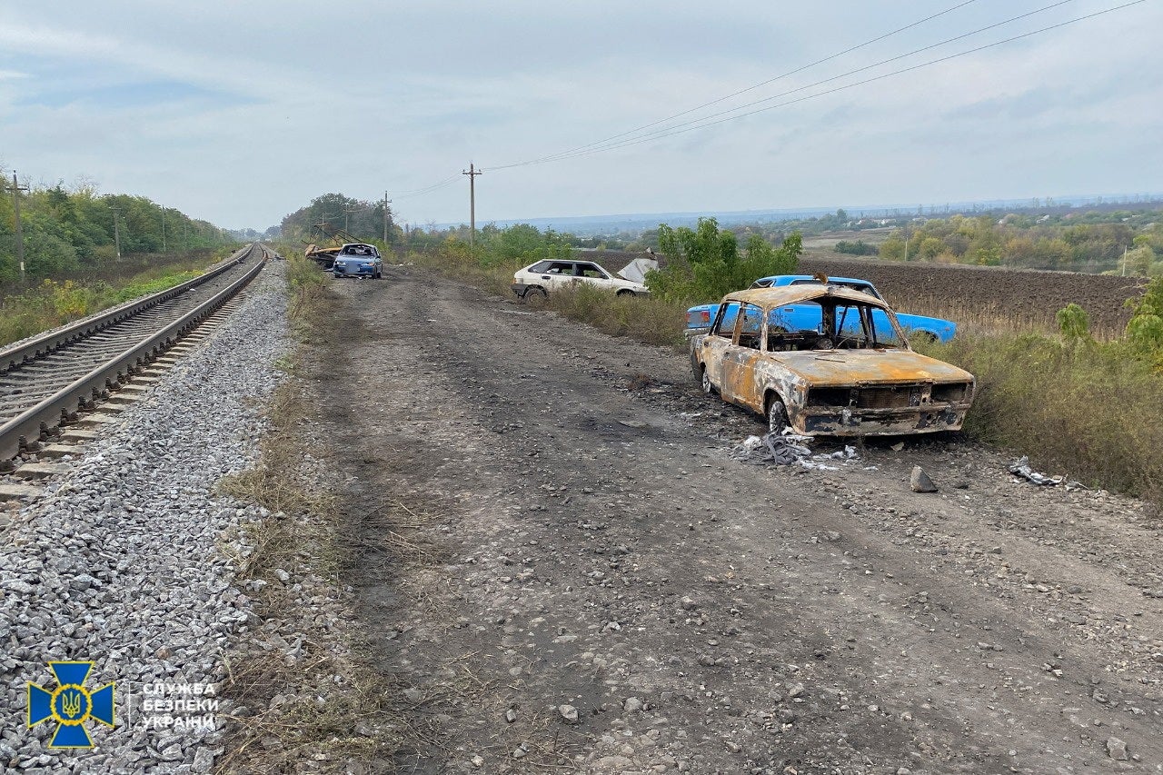 Cars from a civilian convoy, which Ukrainian State Security Service say was hit by a shelling of Russian troops