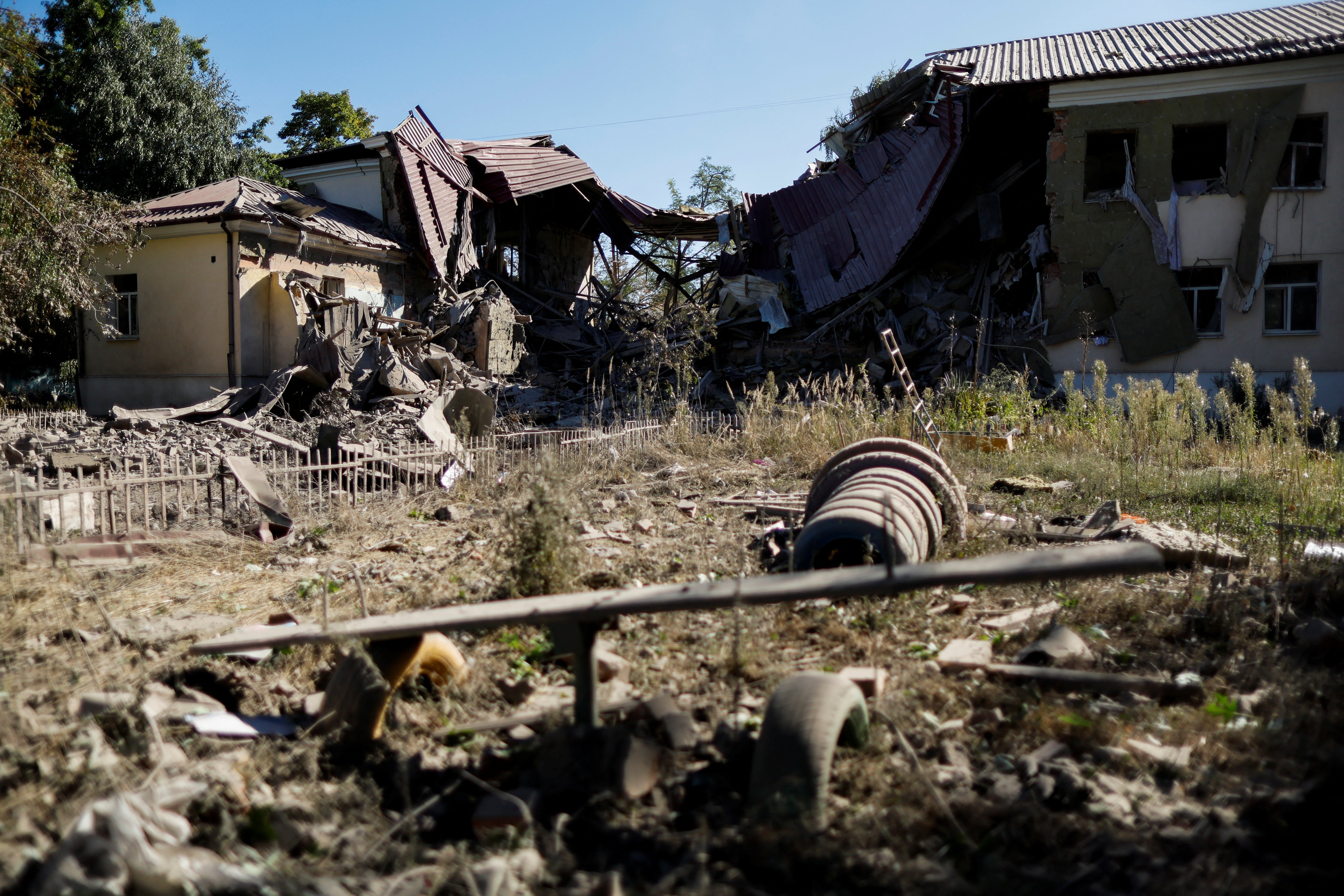 A dusty playground of a damaged kindergarten is seen following recent Russian shelling in the city of Slovyansk in eastern Ukraine