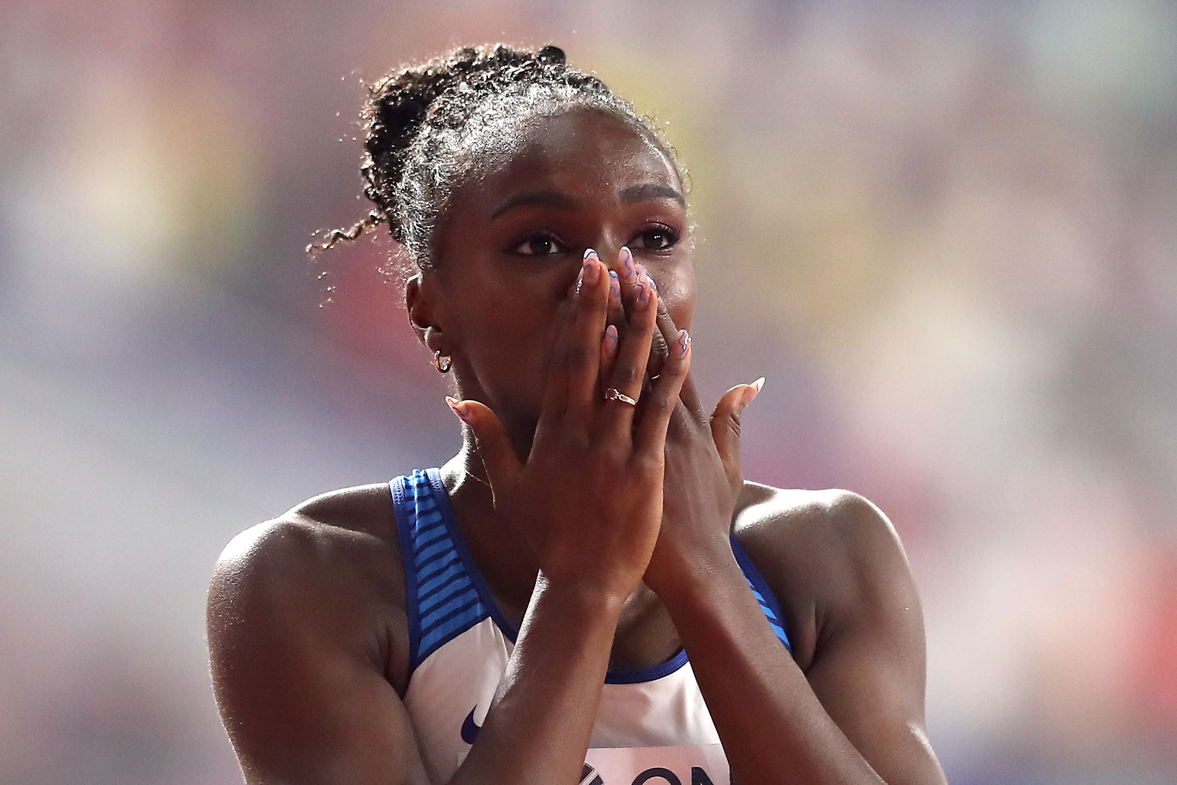 Dina Asher-Smith celebrates a milestone victory (Martin Rickett/PA)