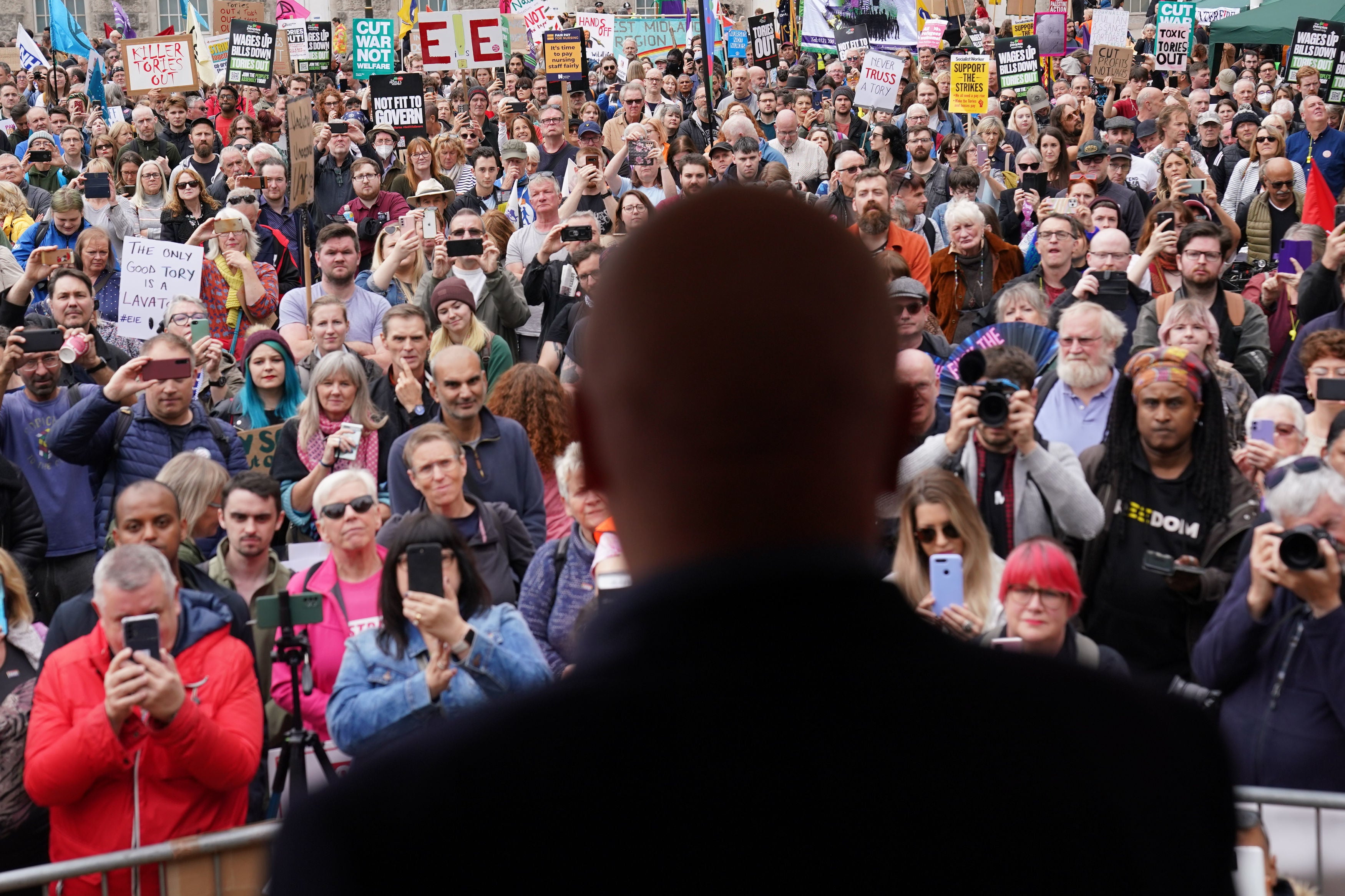 Mick Lynch, general secretary of the Rail, Maritime and Transport union (RMT) speaks to the crowd at a rally in Victoria Square, outside the Conservative Party annual conference