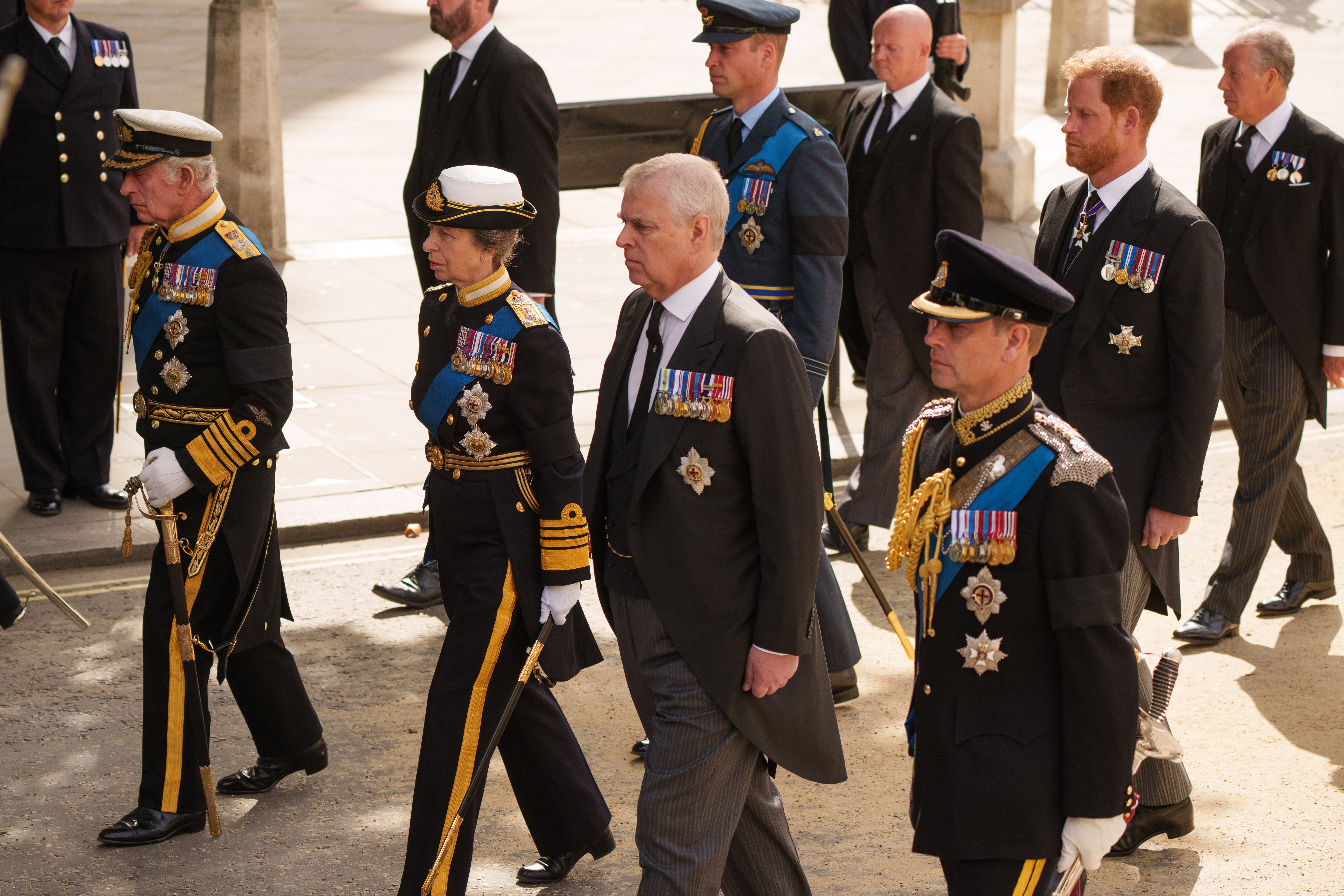 Prince Andrew with his siblings marching behind The Queen's funeral cortege last September