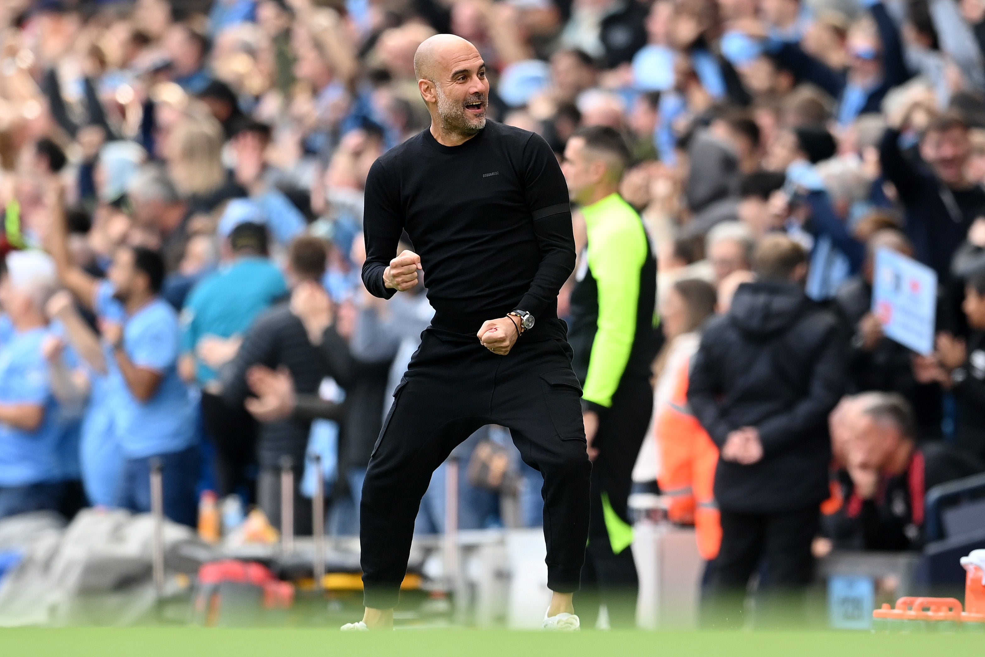 Pep Guardiola reacts to Erling Haaland’s first goal of the day against Man United