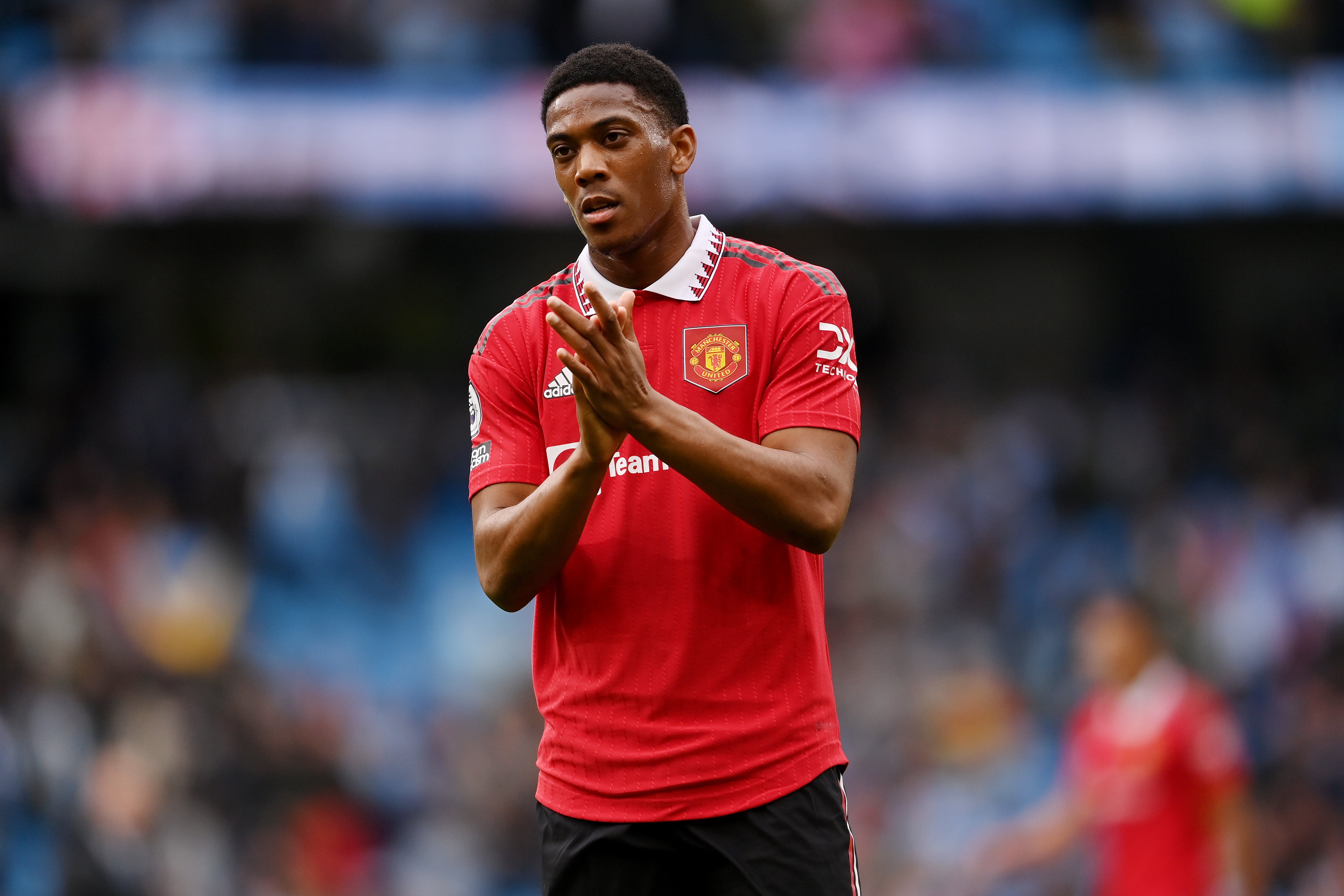 Anthony Martial scored two of United’s three consolation goals