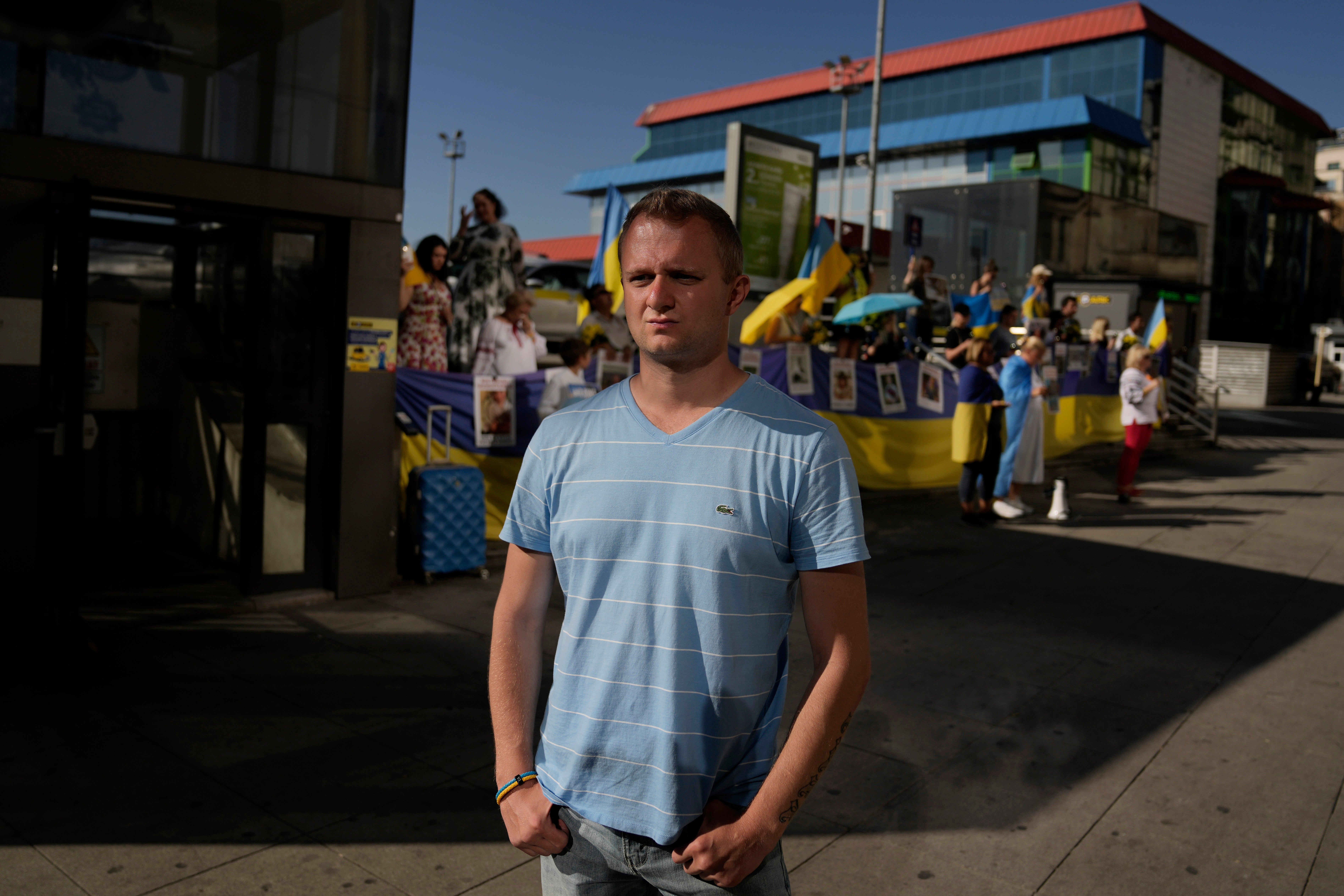 Russian former sales manager and anti-war activist Maxim Bocharov, 38, stands for a photograph next to an anti-war demonstration near the Russian consulate in Istanbul