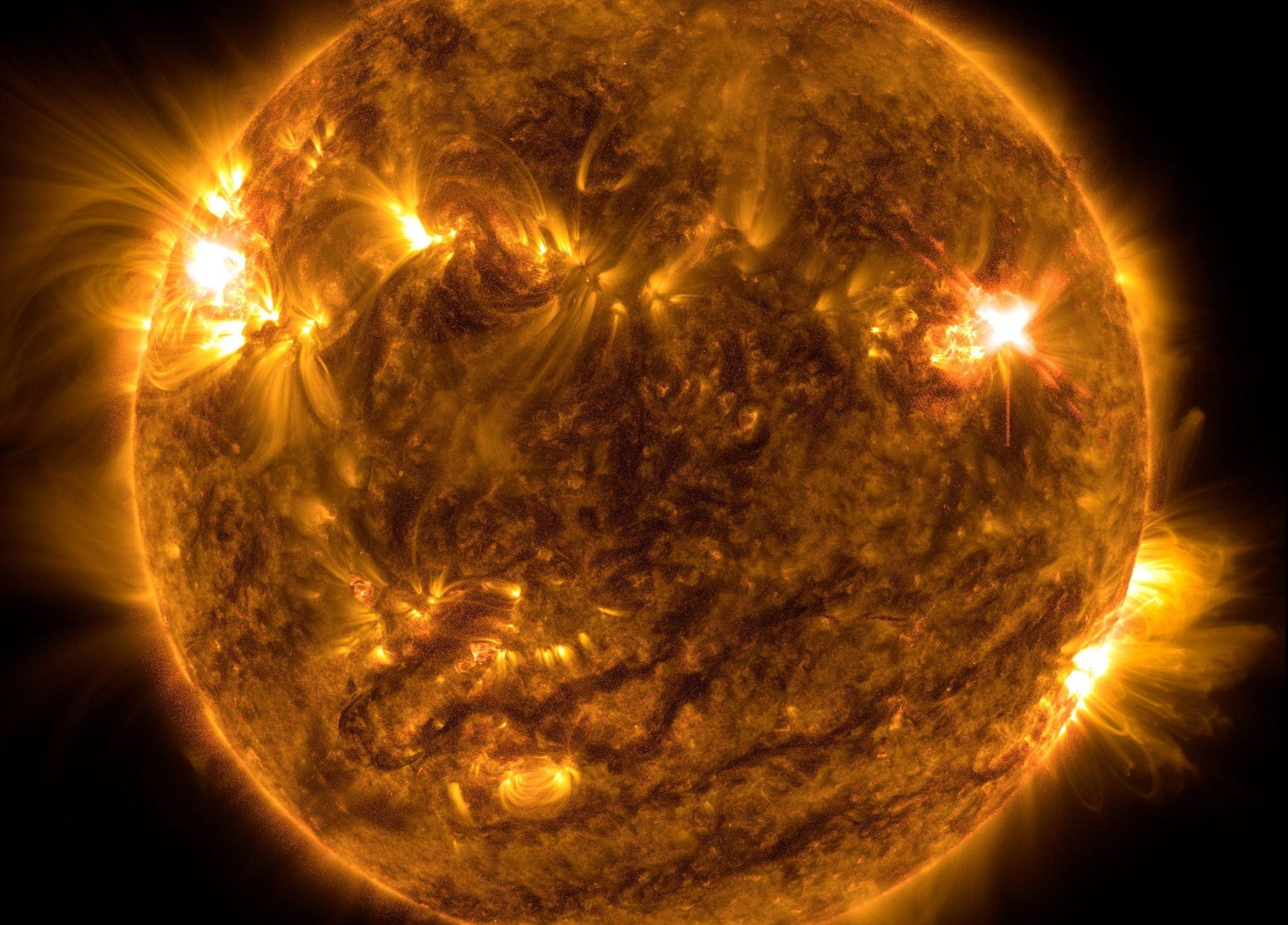 Nasa’s Solar Dynamics Observatory captured this image of a solar flare – as seen in the bright flash on the top right – on 2 October, 2022