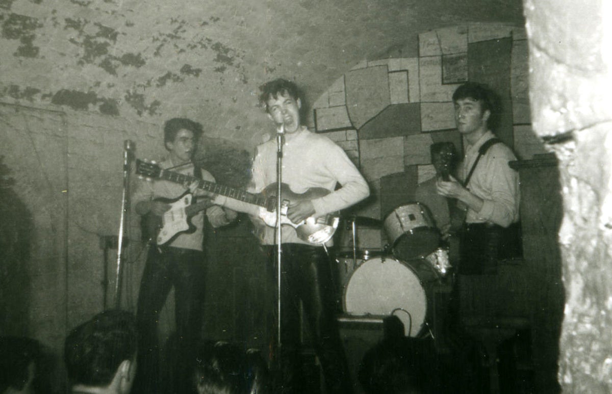 The Beatles playing the Cavern Club in 1961