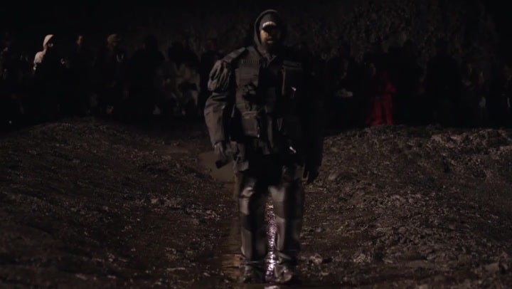 Kanye West walks with Balenciaga models in mud pit for Paris Fashion Week