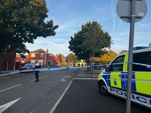 Merseyside Police on Silvester Street where the 60-year-old woman was killed by dogs