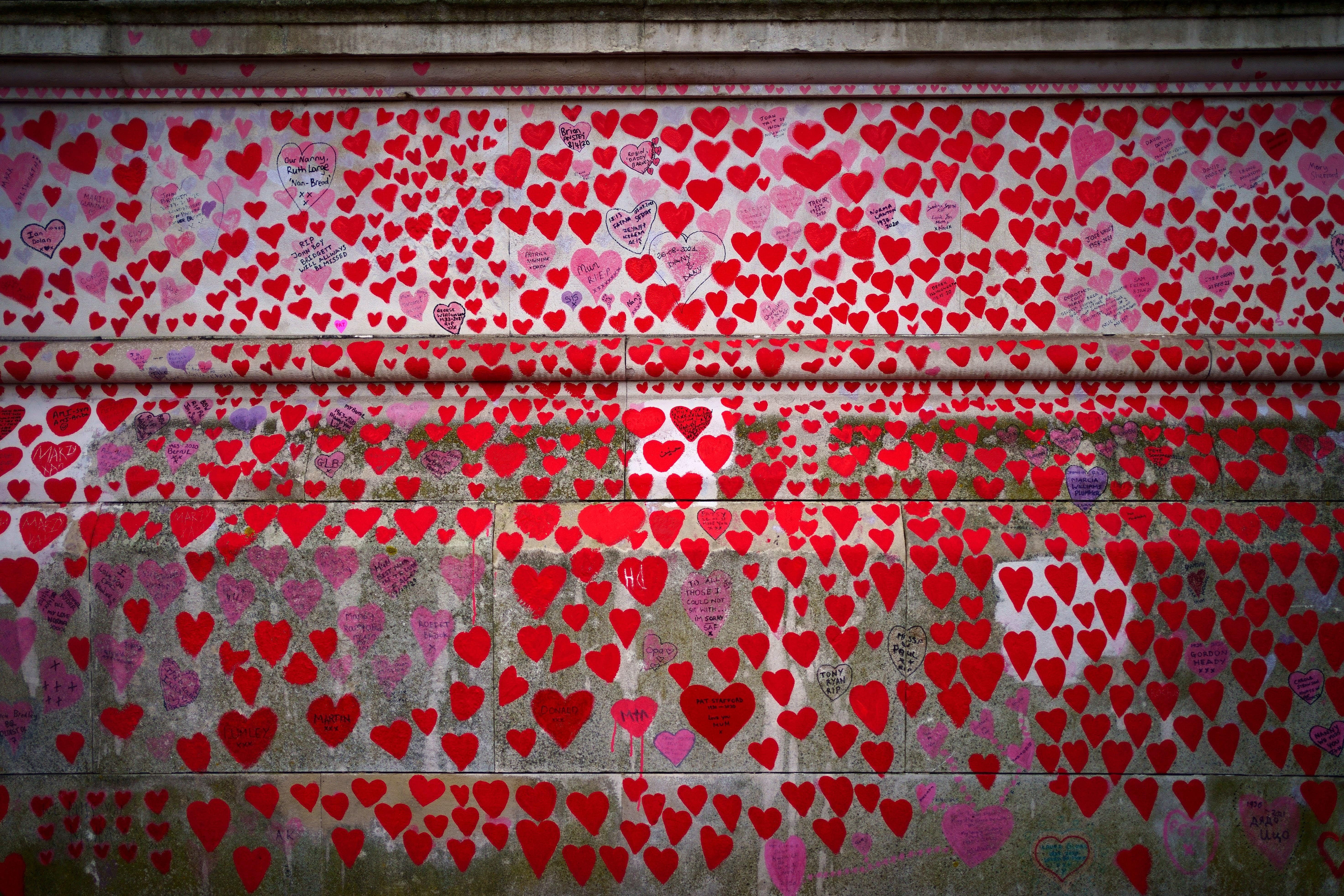 The National Covid Memorial Wall opposite the Palace of Westminster in central London (Victoria Jones/PA)