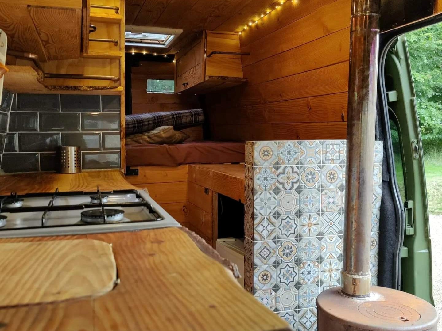 The Ford Transit, which cost £15,000, had already been converted with a stove and a solar panel