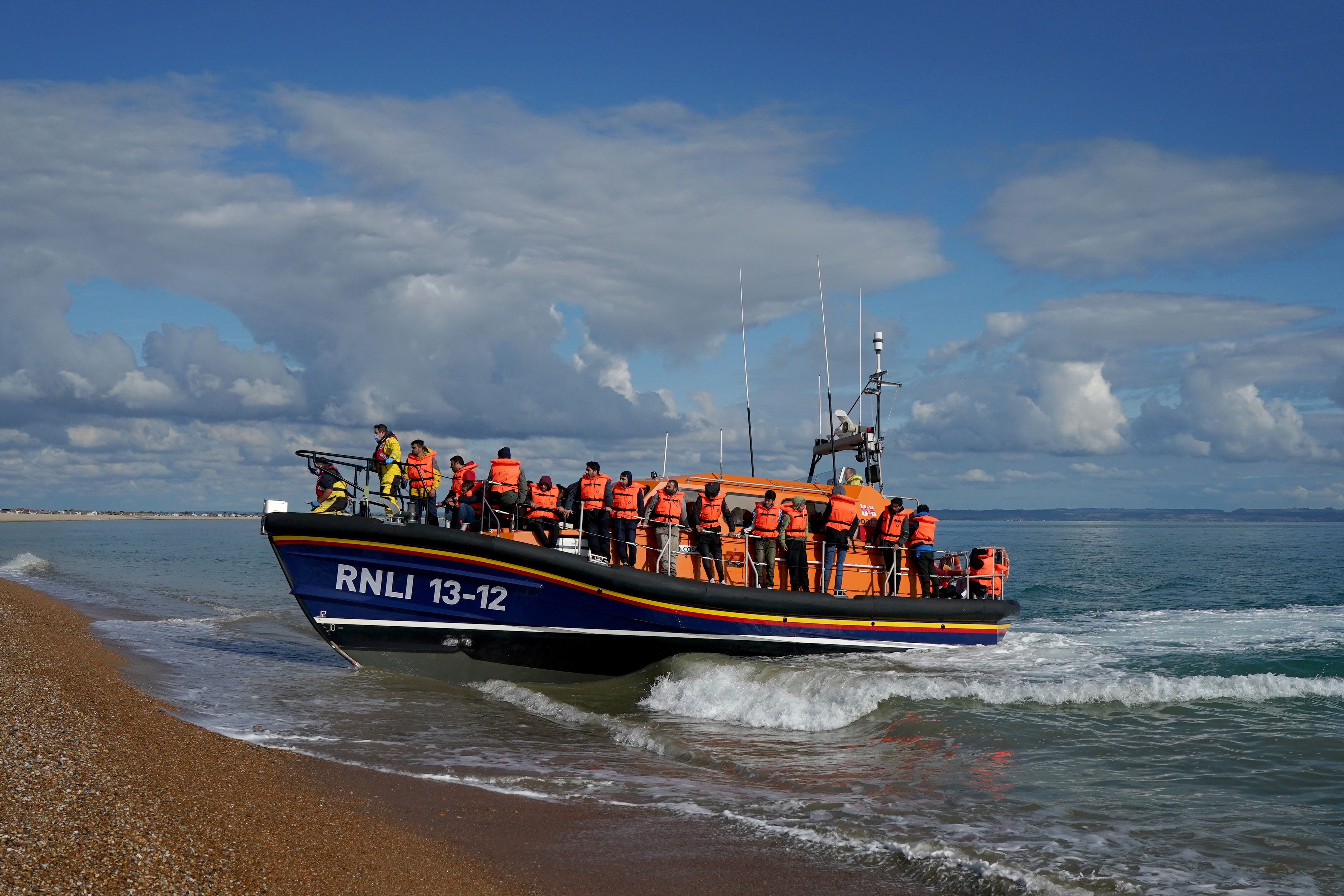 A group of people thought to be migrants are brought in to Dungeness, Kent (Gareth Fuller/PA)