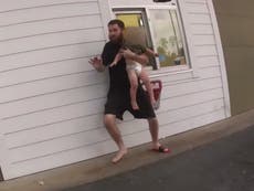 Shocking moment Florida man uses his girlfriend’s kidnapped one-year-old as a shield when police corner him after chase