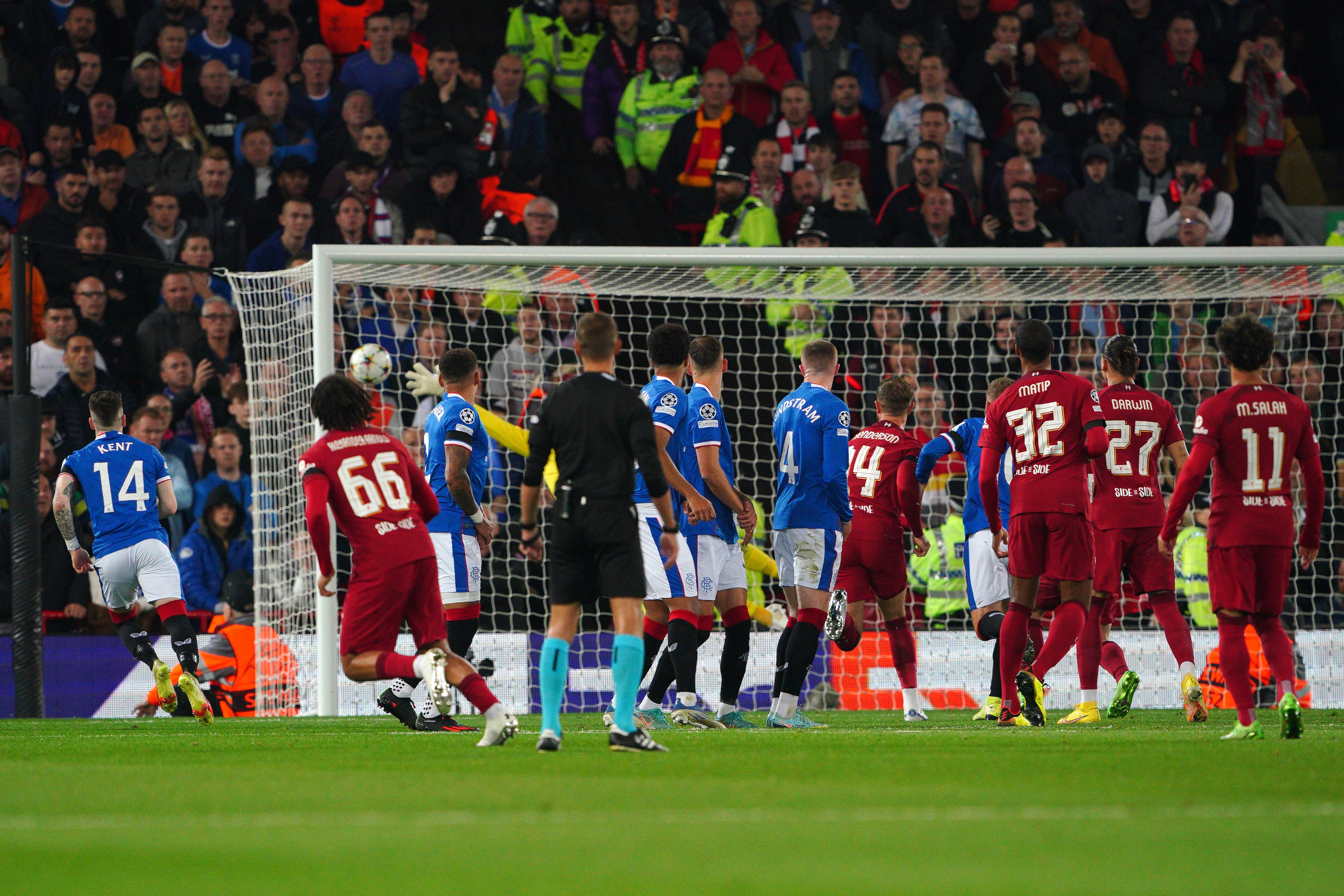 Liverpool’s Trent Alexander-Arnold, second left, opened the scoring against Rangers with a brilliant free-kick (Peter Byrne/PA)