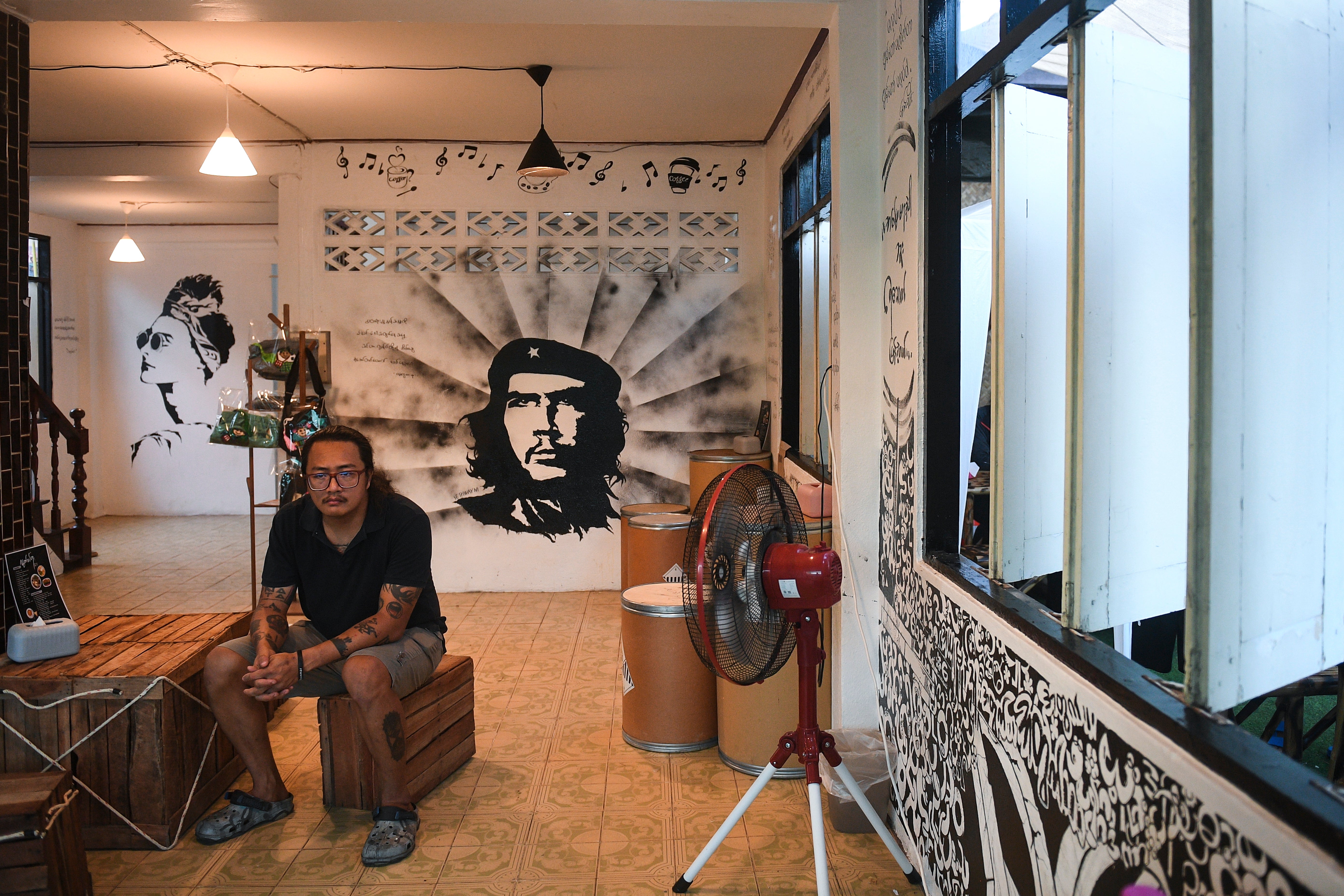Thet Swe Win, 36, the owner of Freedom tea shop along the Thai-Myanmar border