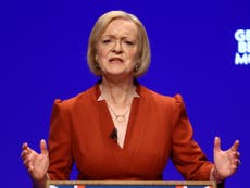 Liz Truss news – live: PM vows to get Britain moving as protesters interrupt speech