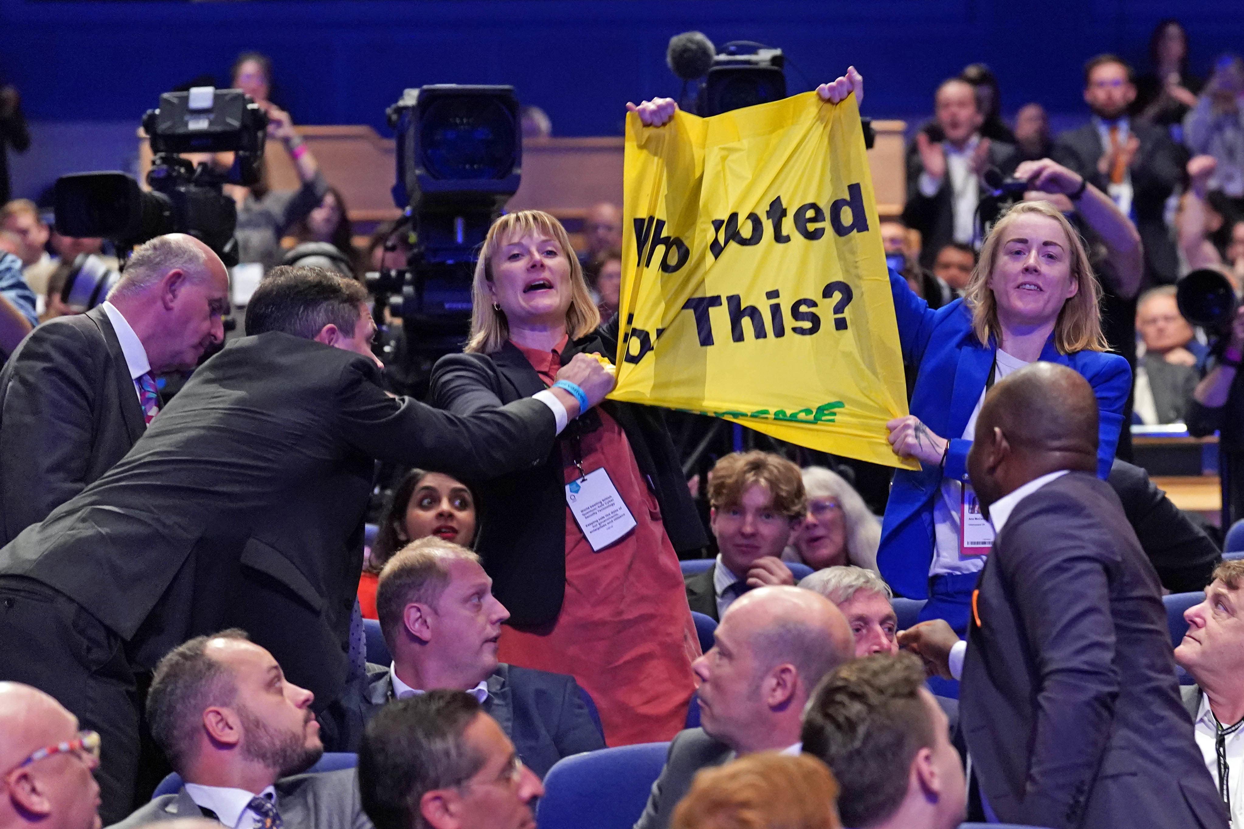 The demonstration during Prime Minister Liz Truss’ speech during the Conservative Party annual conference (Stefan Rousseau/PA)