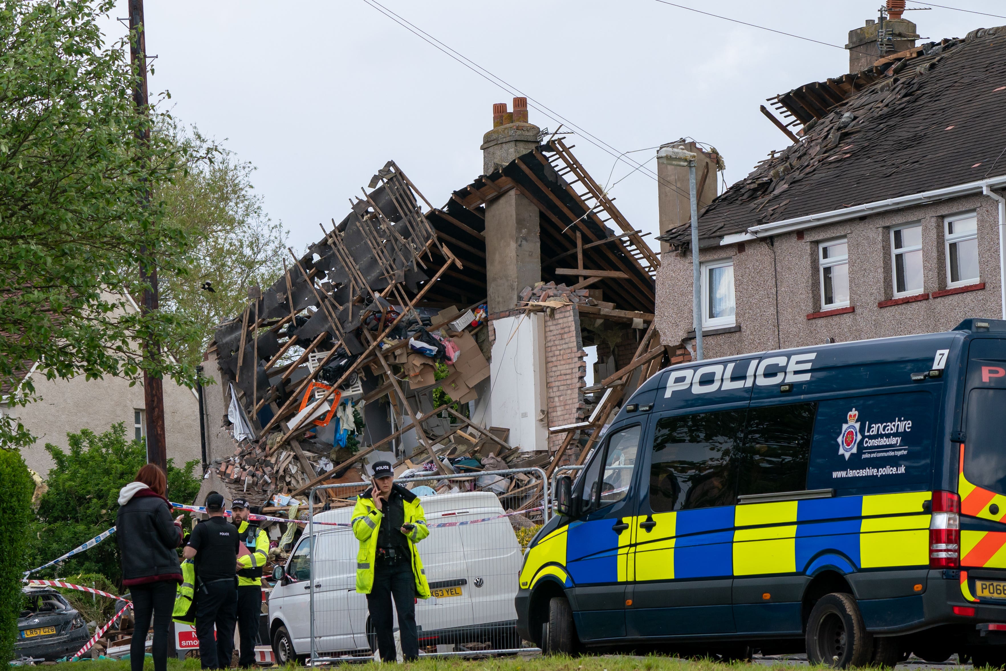 Emergency workers at the scene in Heysham (PA)