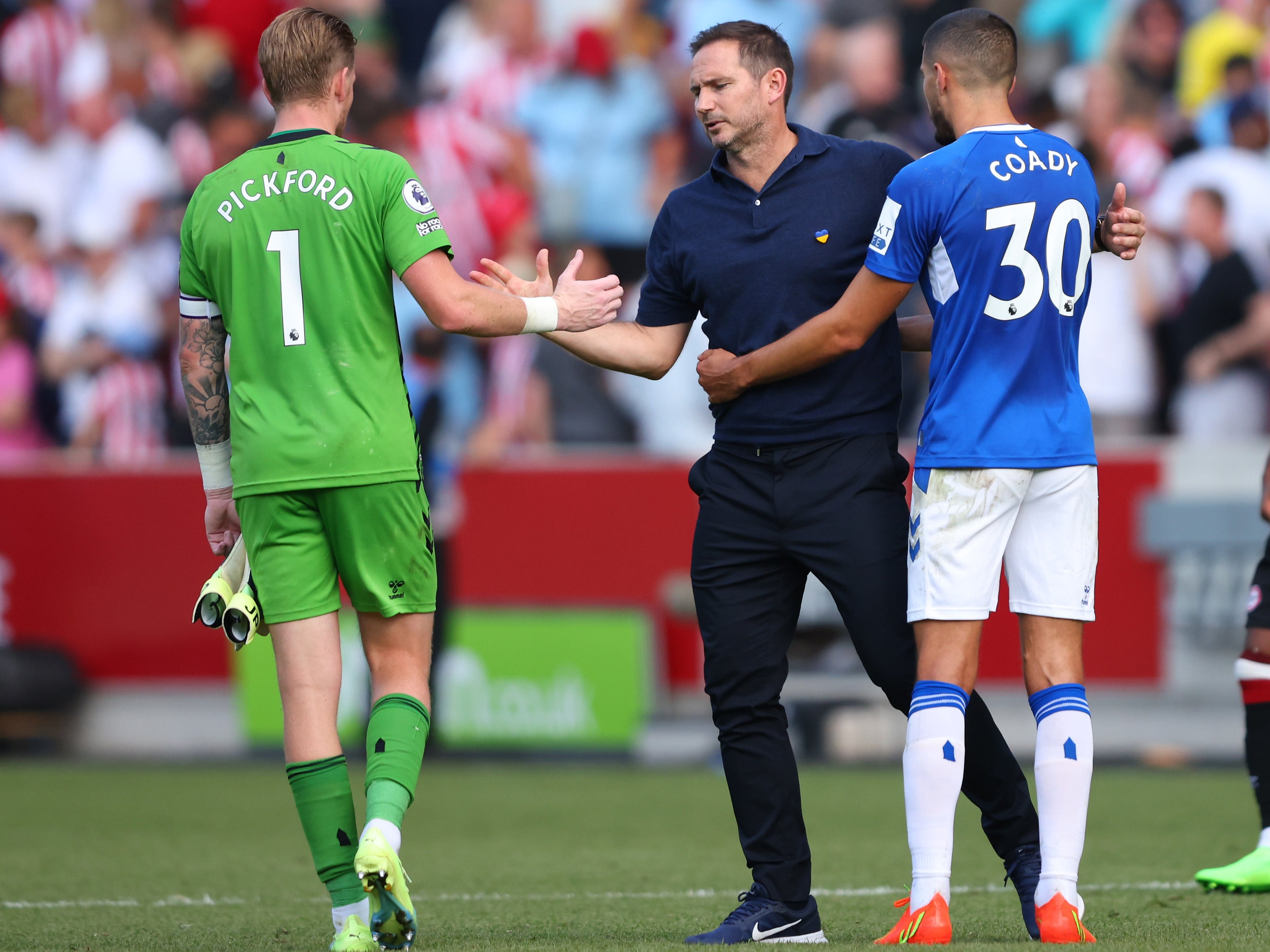 Safe hands: Lampard with Jordan Pickford and Conor Coady