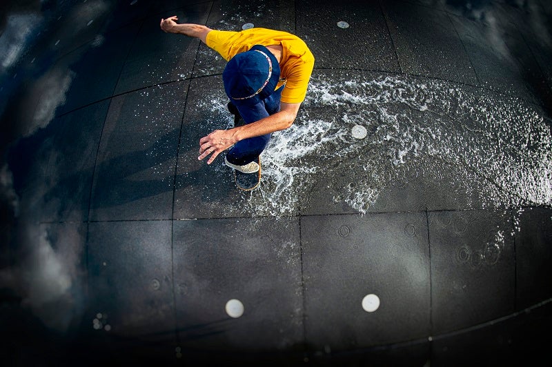 Leo Valls tries out a power slide on the Mirroir d’Eau