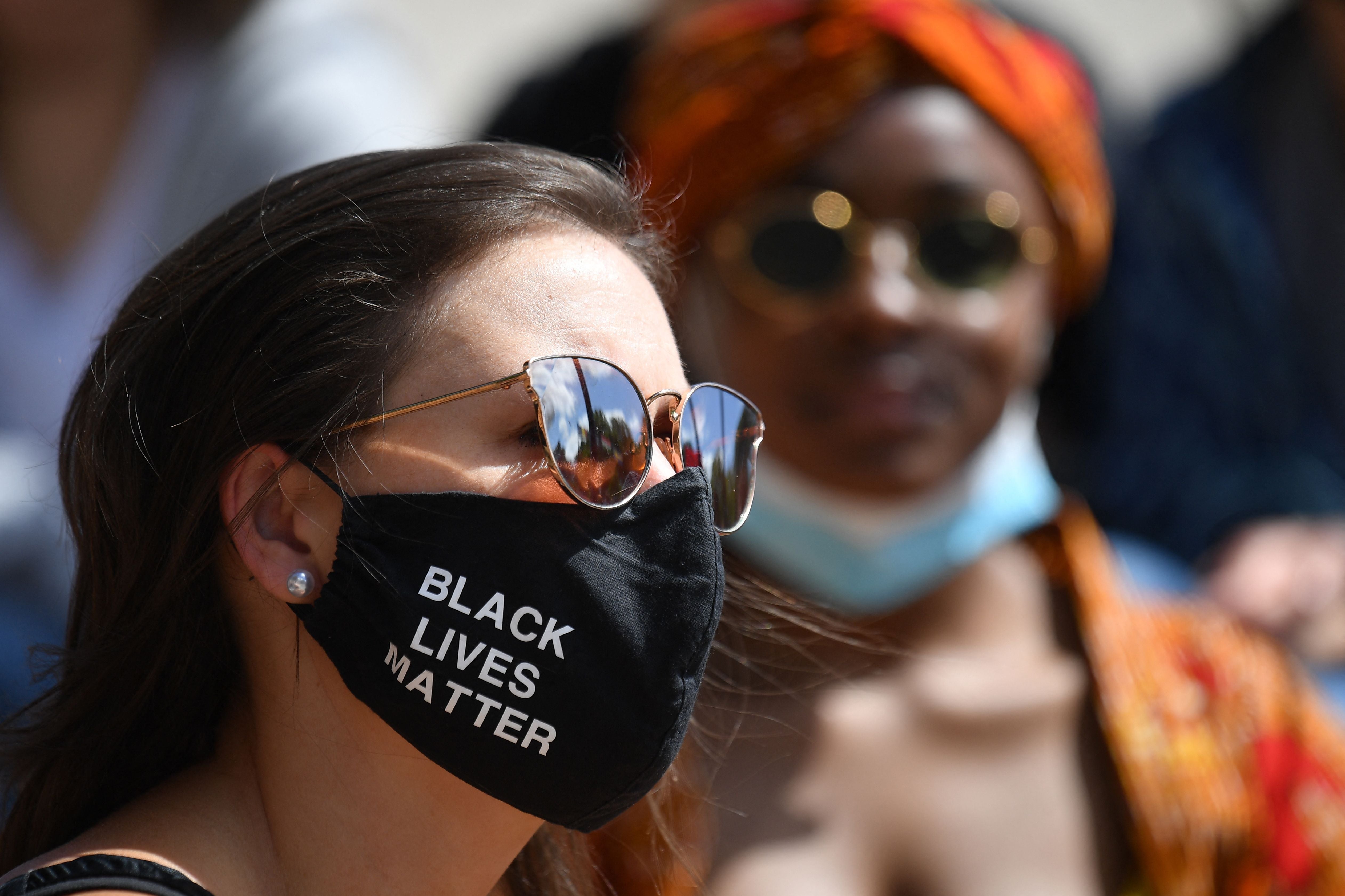 A protester attends a BLM march in May 2020