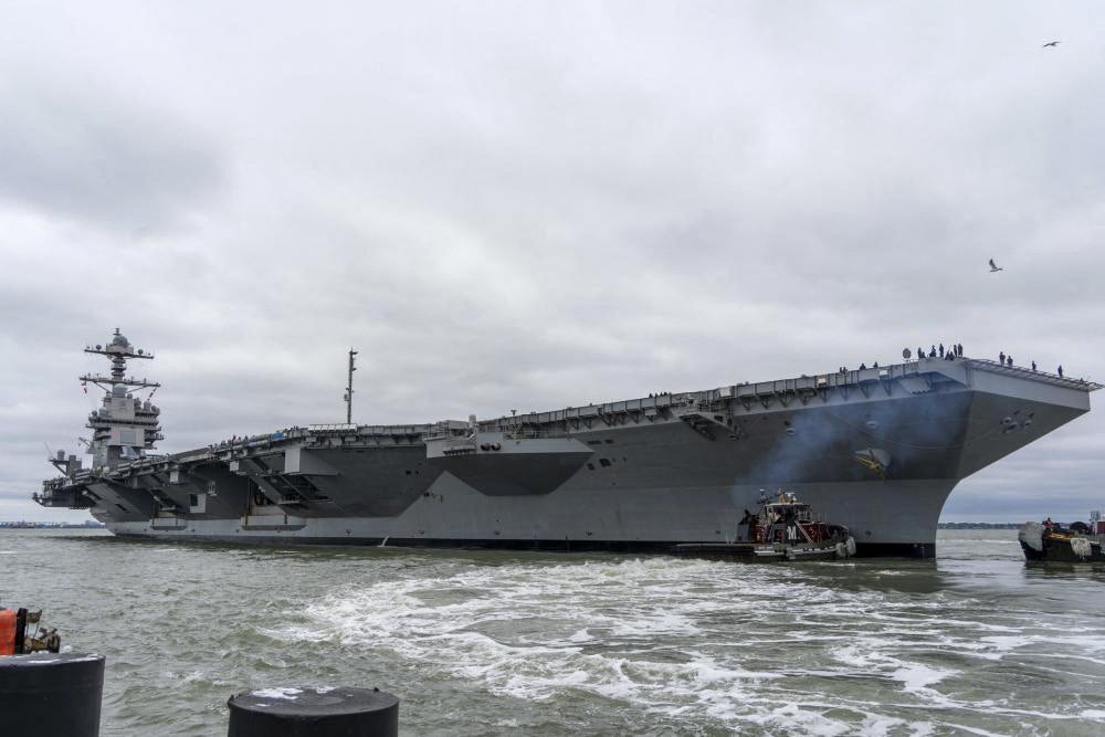 This handout photo provided by the US Navy shows the USS Gerald R. Ford-class aircraft carrier USS Gerald R. Ford (CVN 78) departing Naval Station Norfolk, Virginia on October 4, 2022