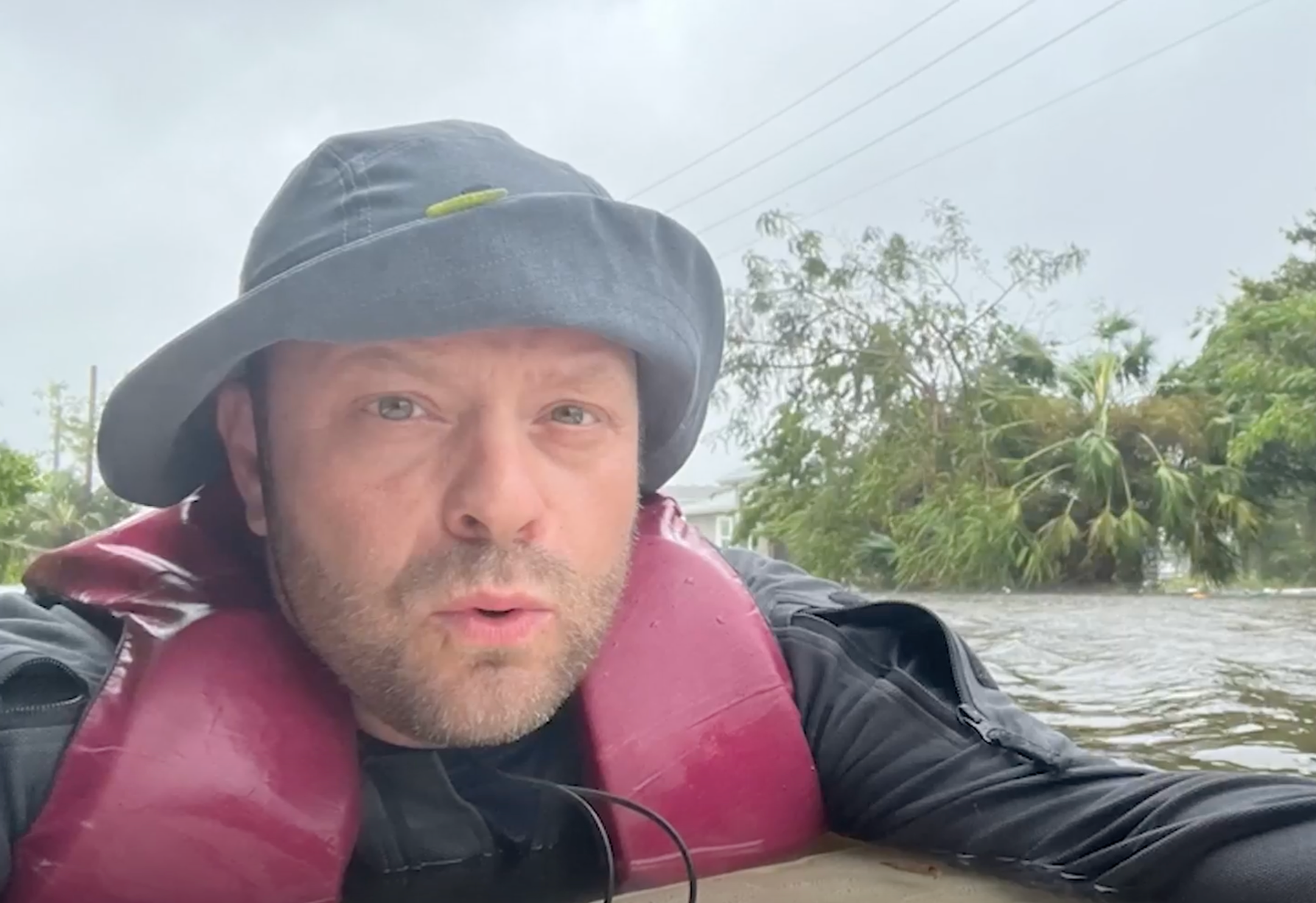 Naples, Florida, resident Johnny Lauder rescues his mother during Hurricane Ian