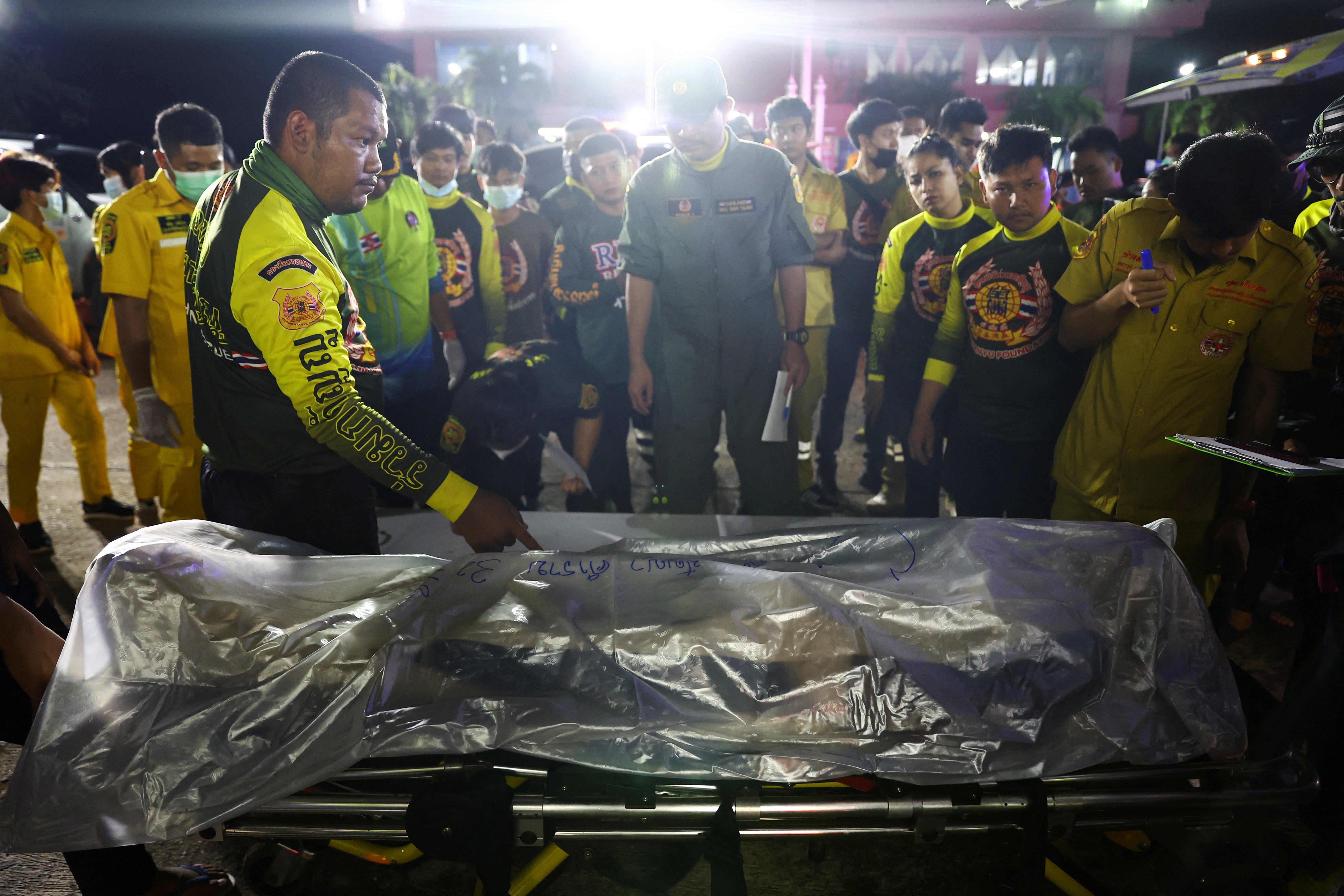 The body Panya Khamrap inside a body bag at Na Klang Hospital