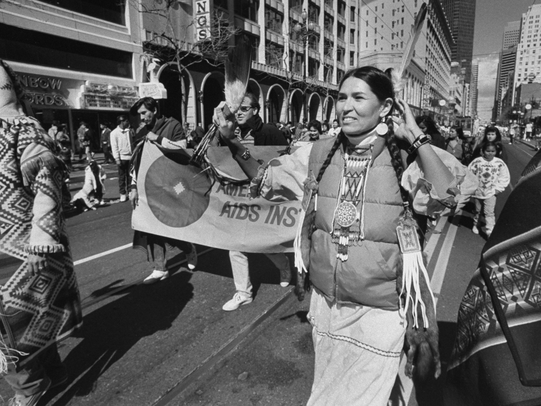 Littlefeather marching in a street parade in San Francisco