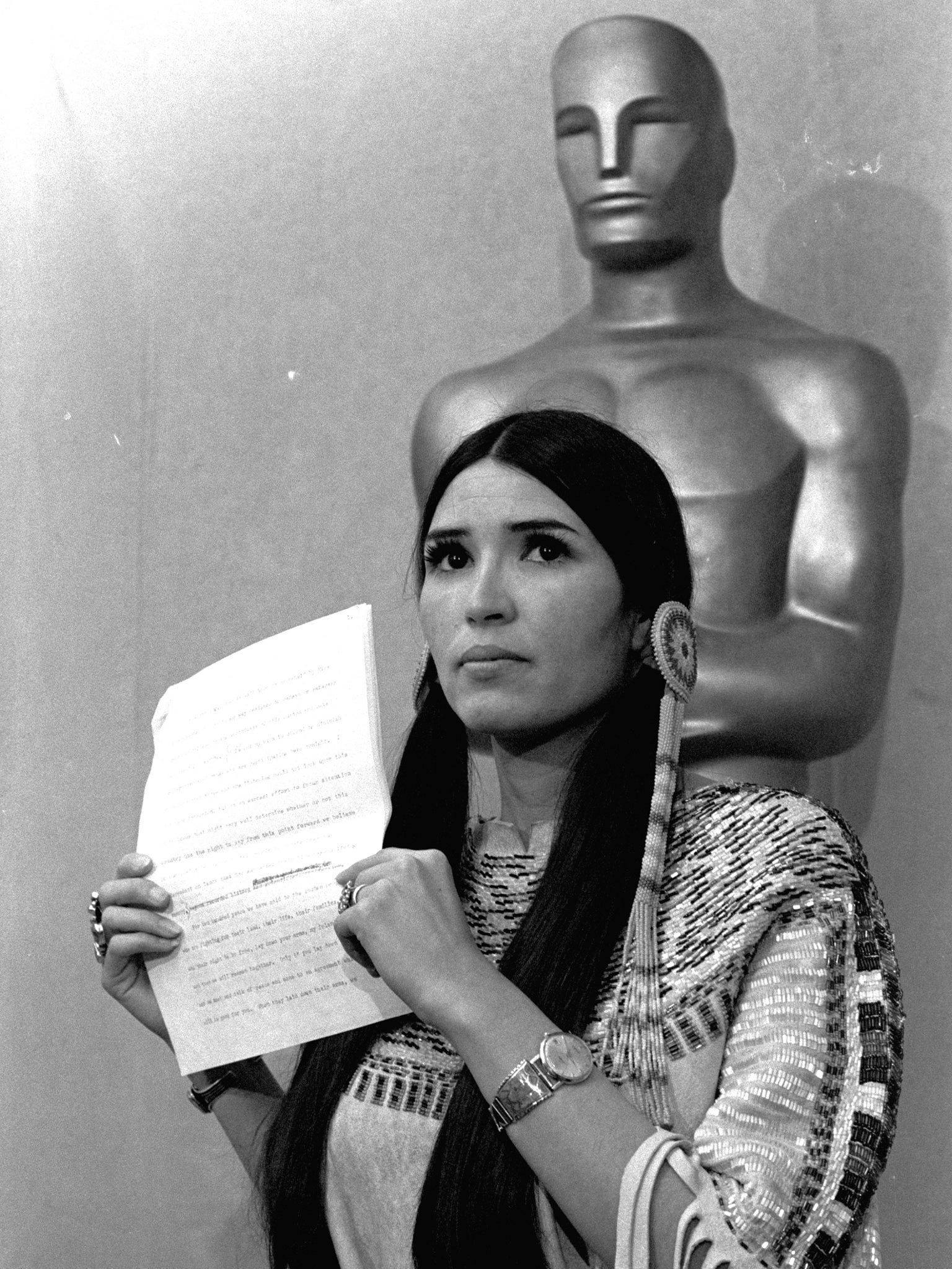 Littlefeather telling the audience at the 1973 Academy Awards ceremony in Los Angeles that Marlon Brando was declining to accept his Oscar