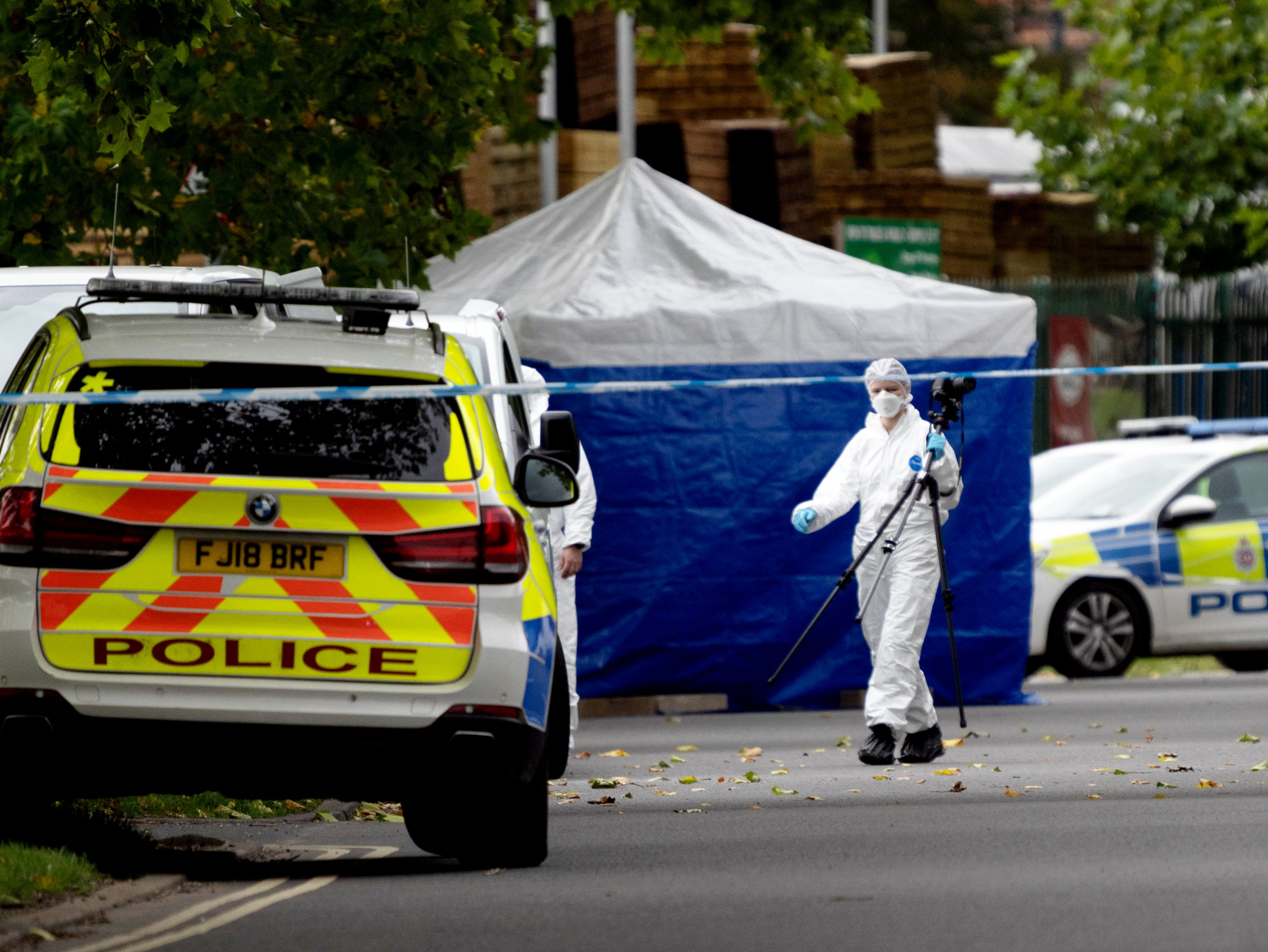 Police forensic officers at Ascot Drive police station in Derby