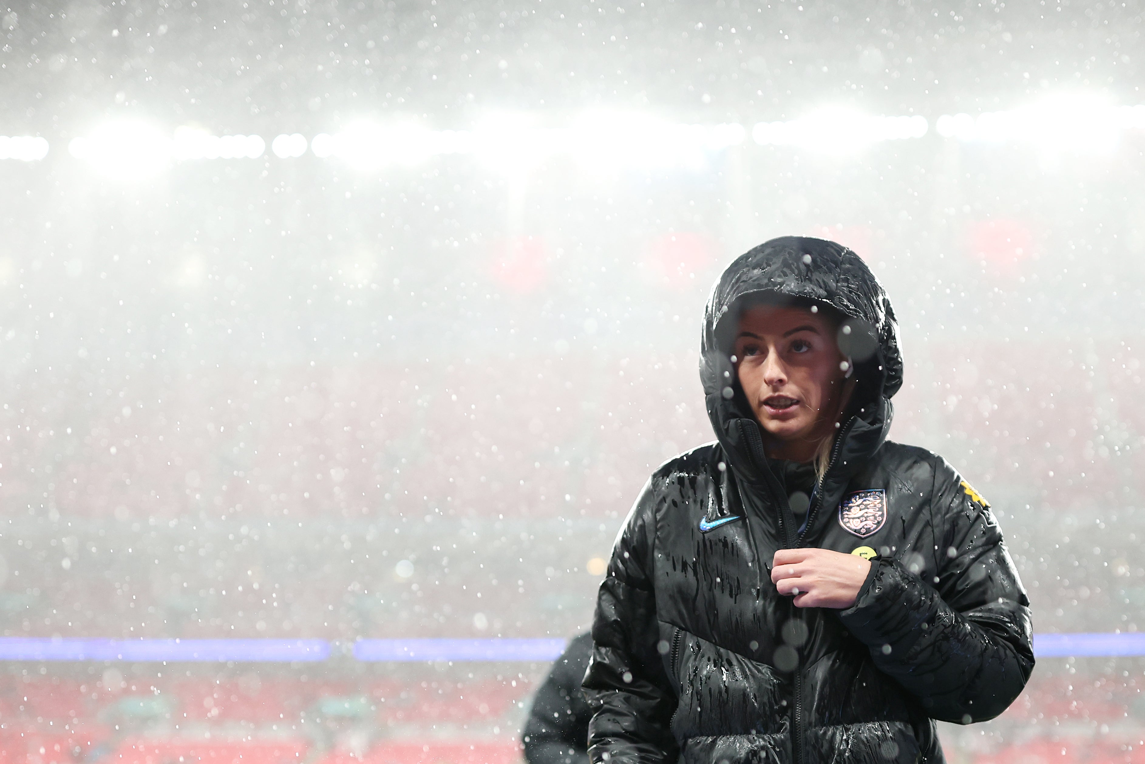 Chloe Kelly of England inspects the pitch