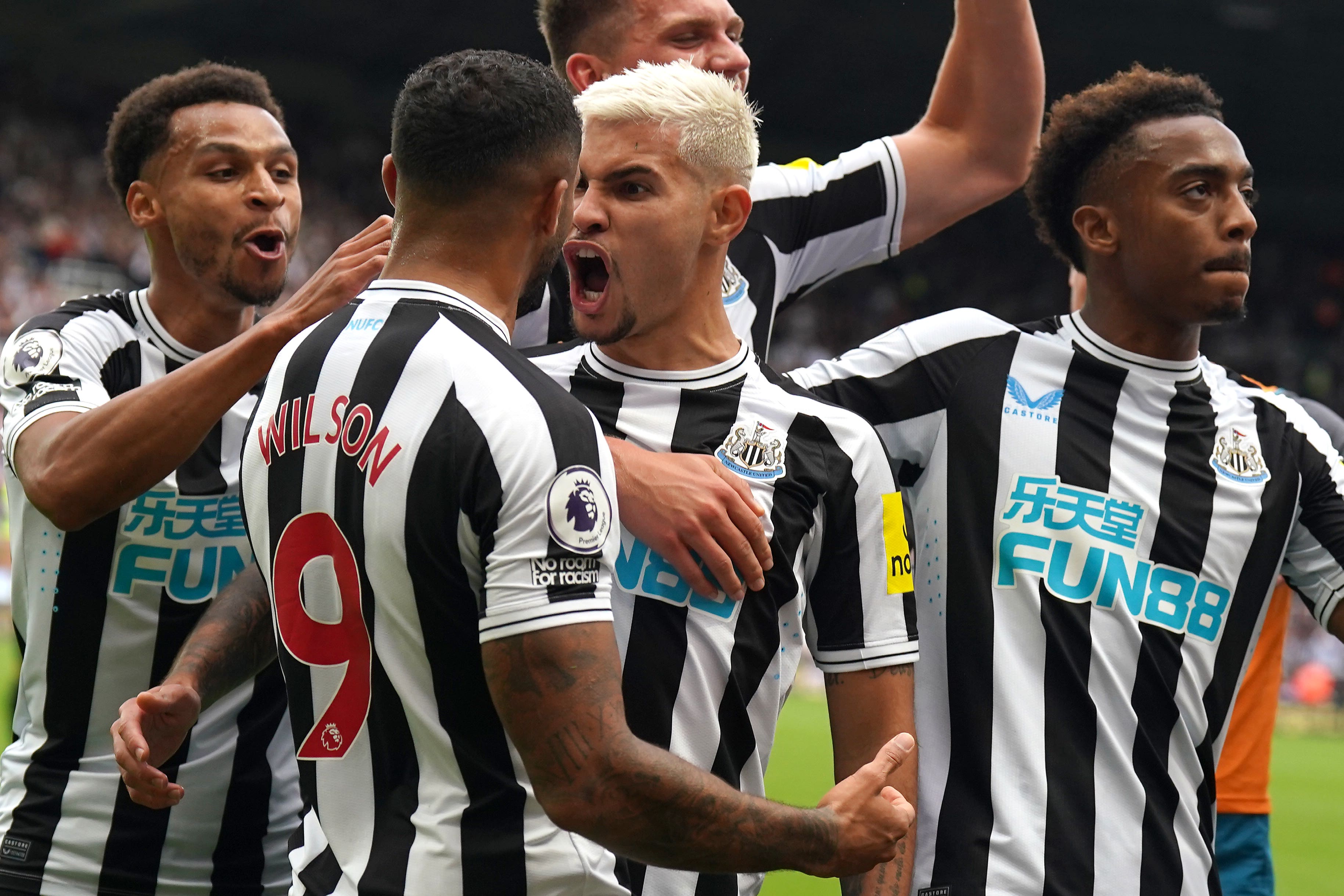 Bruno Guimaraes, centre, scored twice for Newcastle (Owen Humphreys/PA)