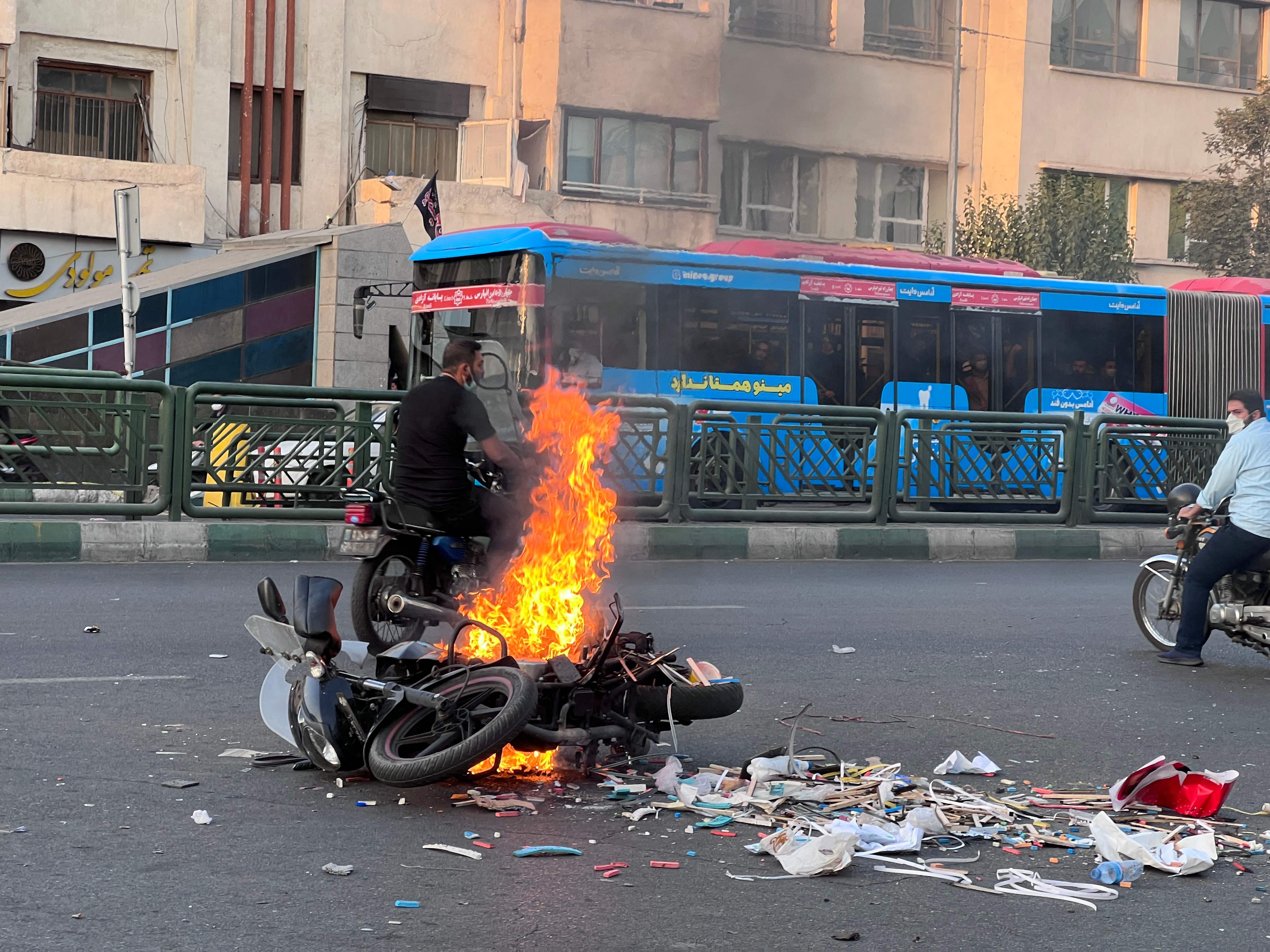 A motorcycle on fire in the Iran capital Tehran