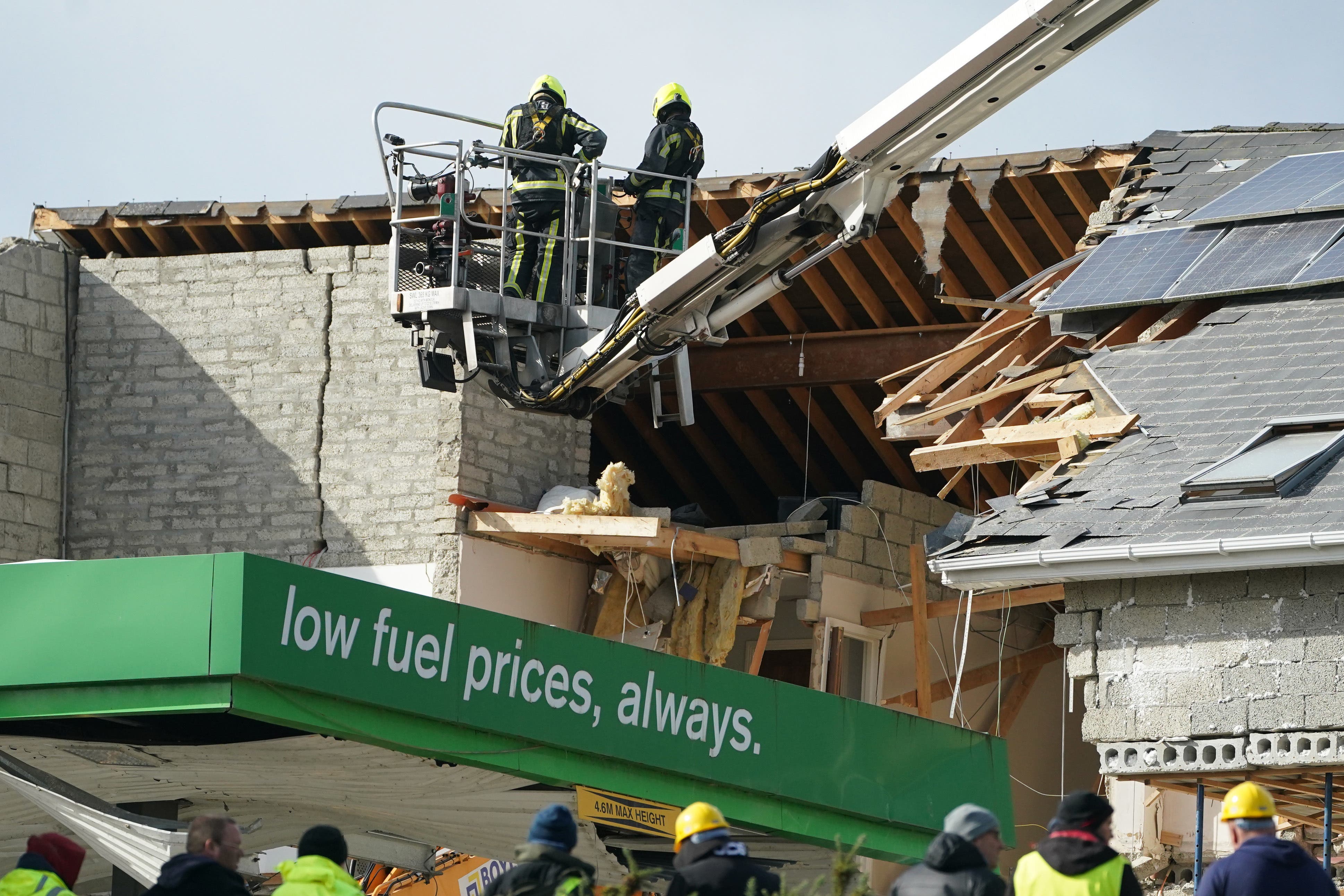 Emergency services continue their work at the scene of the explosion at Applegreen service station in the village of Creeslough in Co Donegal (PA)