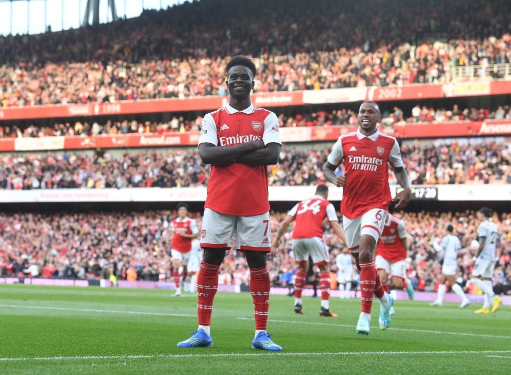 Bukayo Saka celebrates scoring the second Arsenal goal