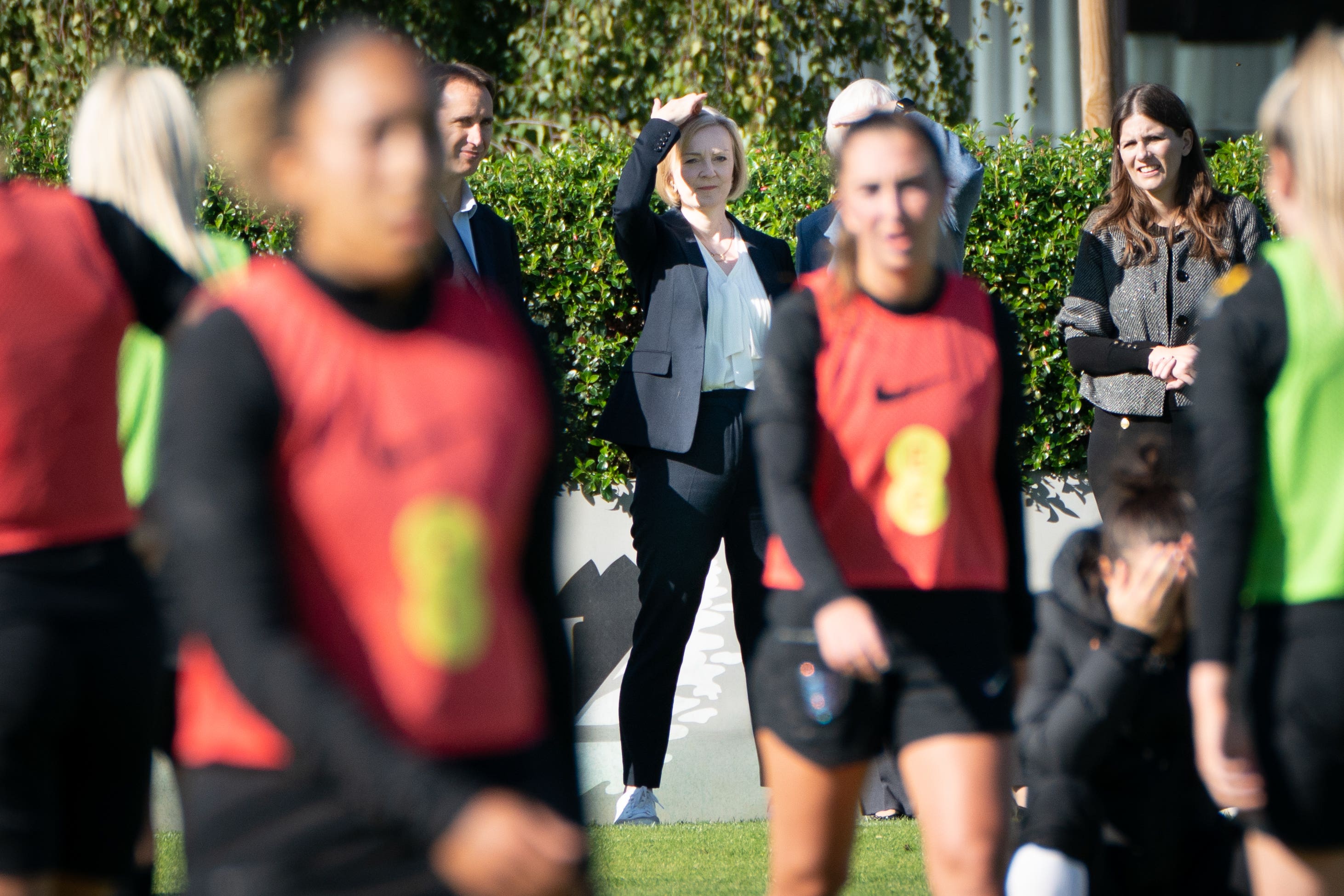 Prime Minister Liz Truss watches the England women’s football team training at the Lensbury Resort, Teddington, south west London, following their Euro 2022 victory in July. Picture date: Monday October 10, 2022.