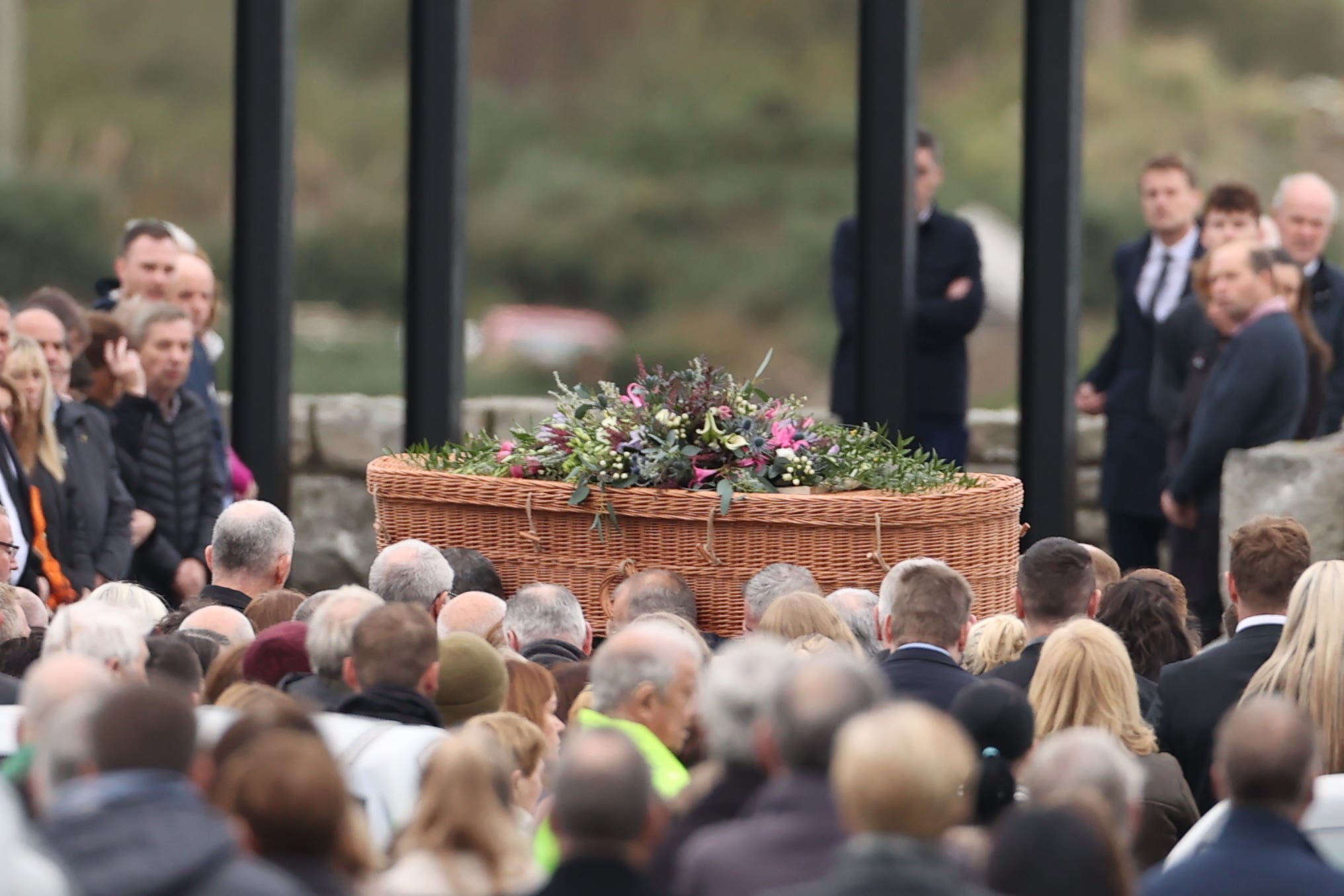 The coffin of Jessica Gallagher, 24, is carried into St Michael’s Church, Creeslough, for her funeral mass (Liam McBurney/PA)