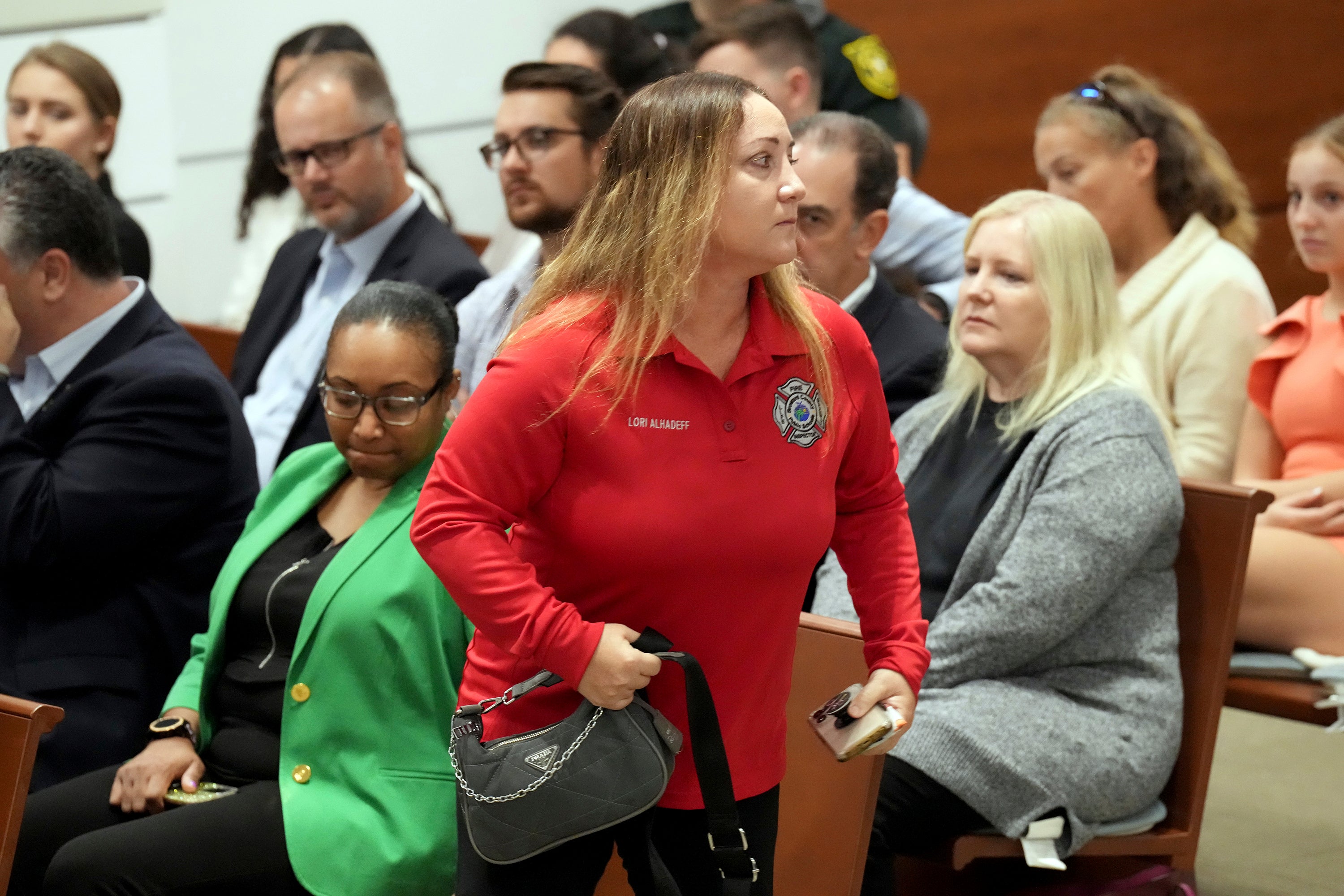 Lori Alhadeff, mother of Alyssa Alhadeff, leaves the courtroom as Assistant State Attorney Mike Satz details the murders of the 17 students and staff members