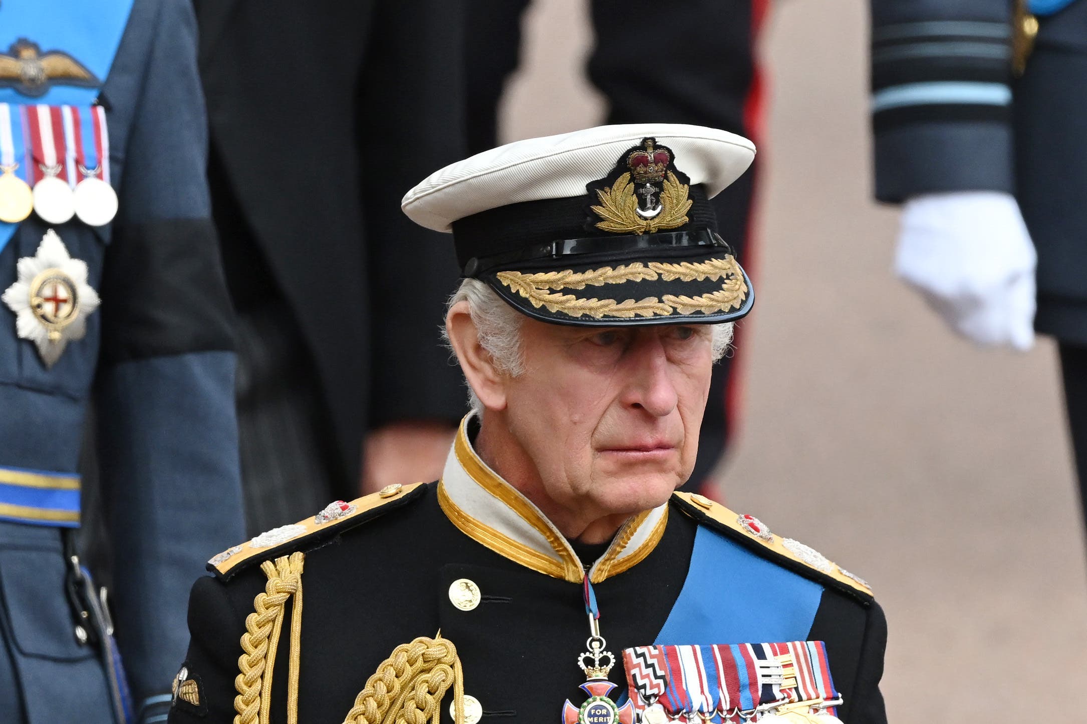 Charles III during the ceremonial procession of his mother’s coffin