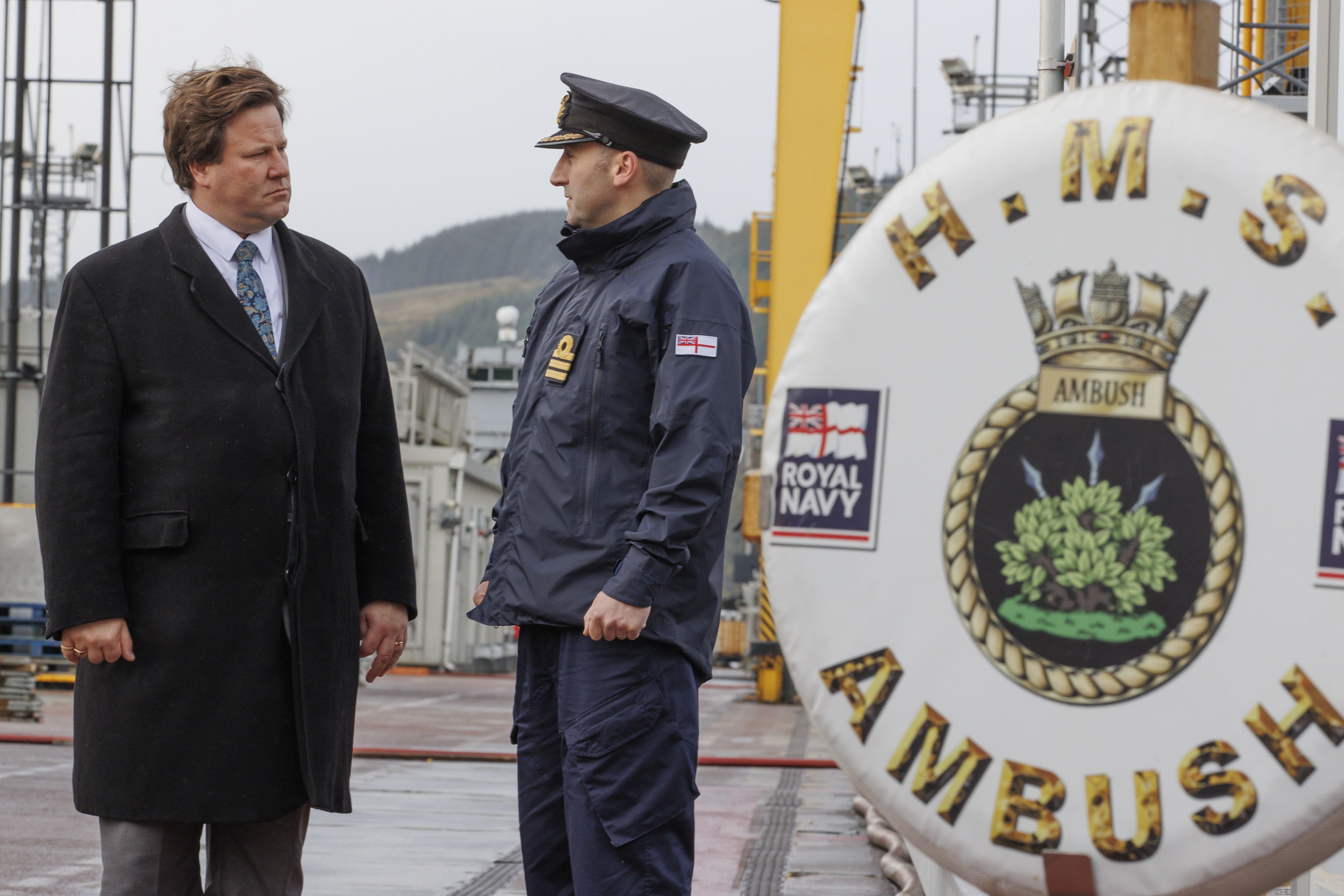 Defence procurement minister Alec Shelbrooke meets Commander Morrow from attack submarine HMS Ambush during a visit to Faslane naval base in Scotland (Steve Welsh/PA)