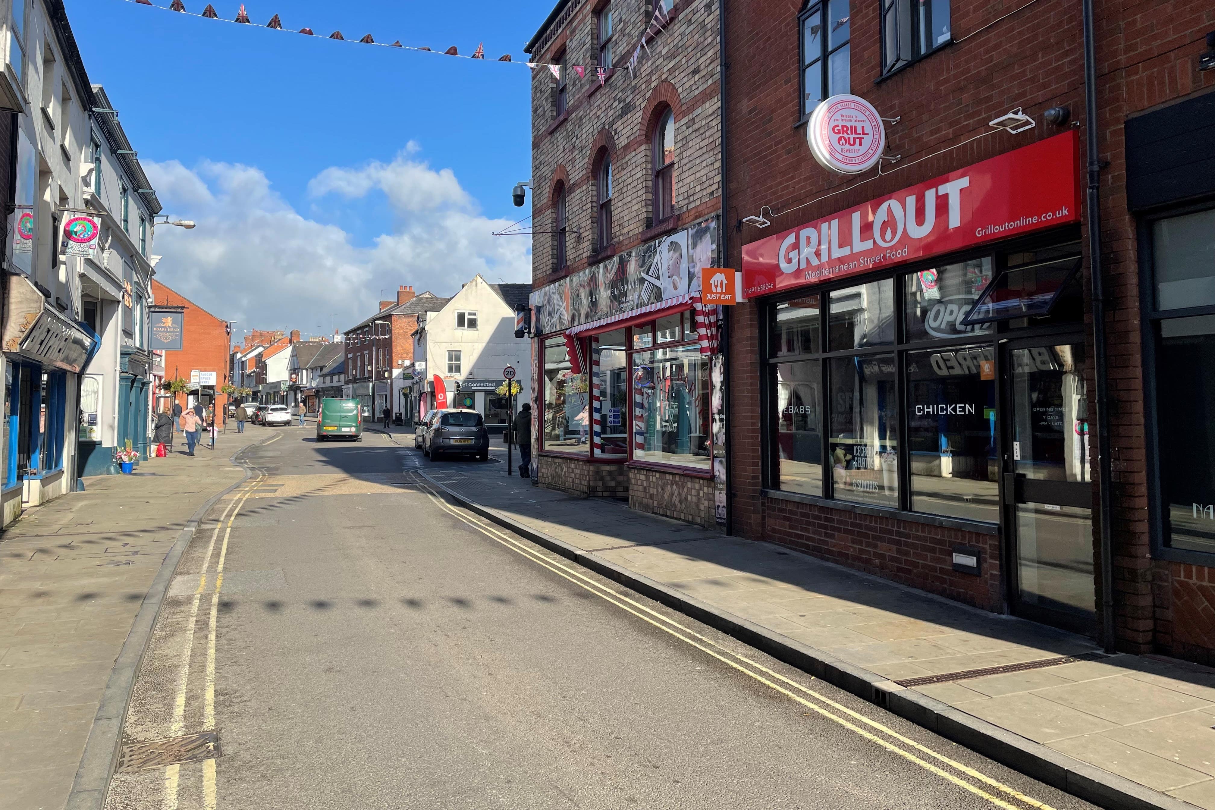 The scene on Willow Street, Oswestry, Shropshire, where Rebecca Steer, 22, was killed after being hit by a car which mounted the kerb outside the Grill Out takeaway in the early hours of Sunday (PA)