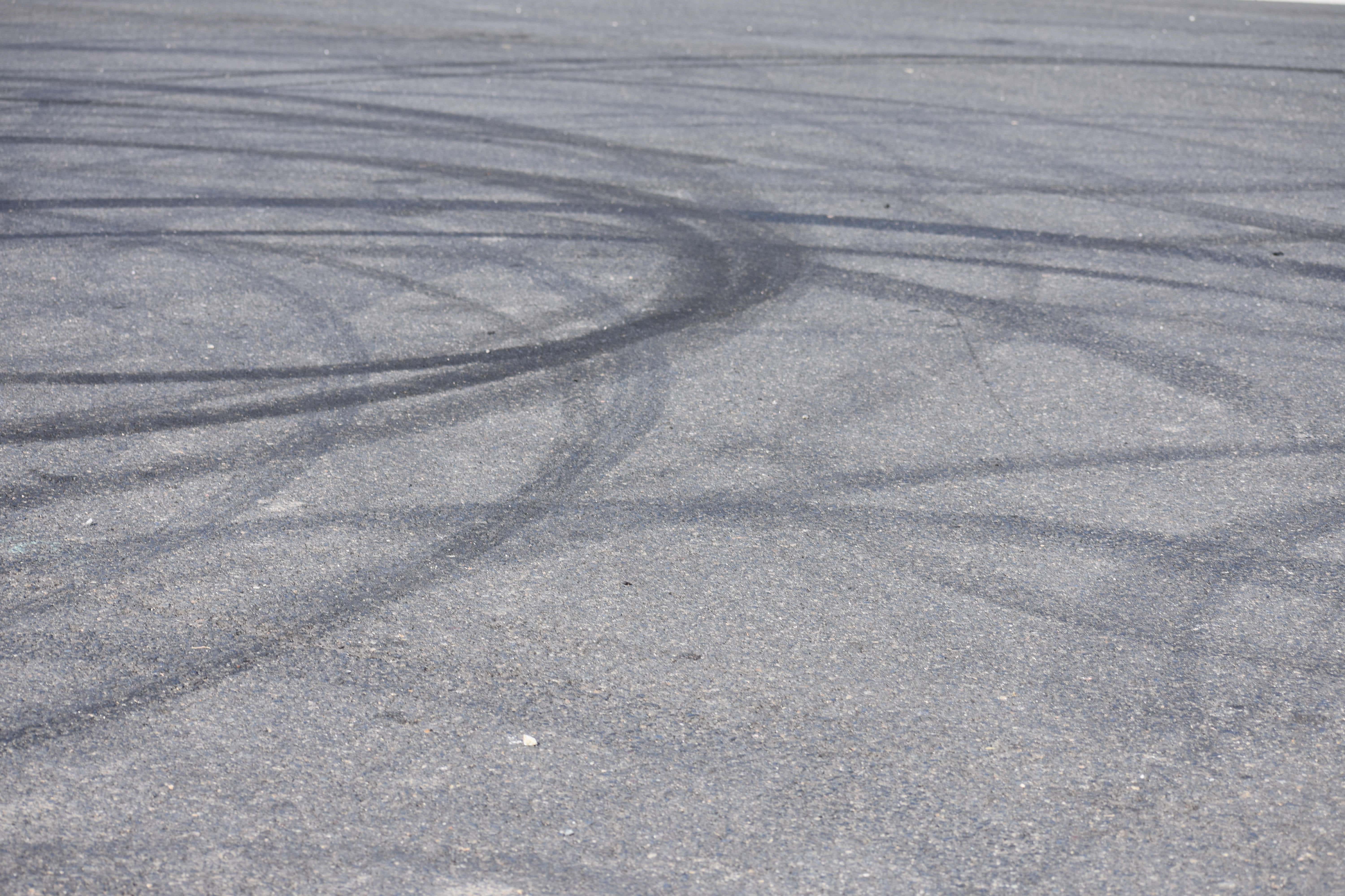 A police force has released drone footage of a man performing doughnuts in his car – with a person on the roof (Parker Raimondo/Alamy/PA)